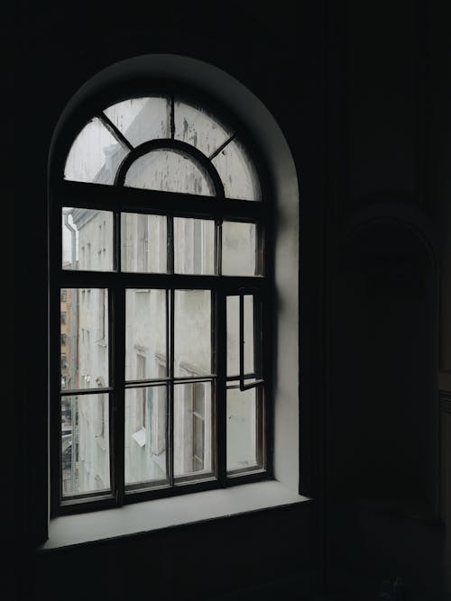 Arched Glass Window With Dark Background