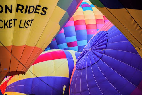 Close-up Of Inflated Multi-Colored Hot Air Balloons