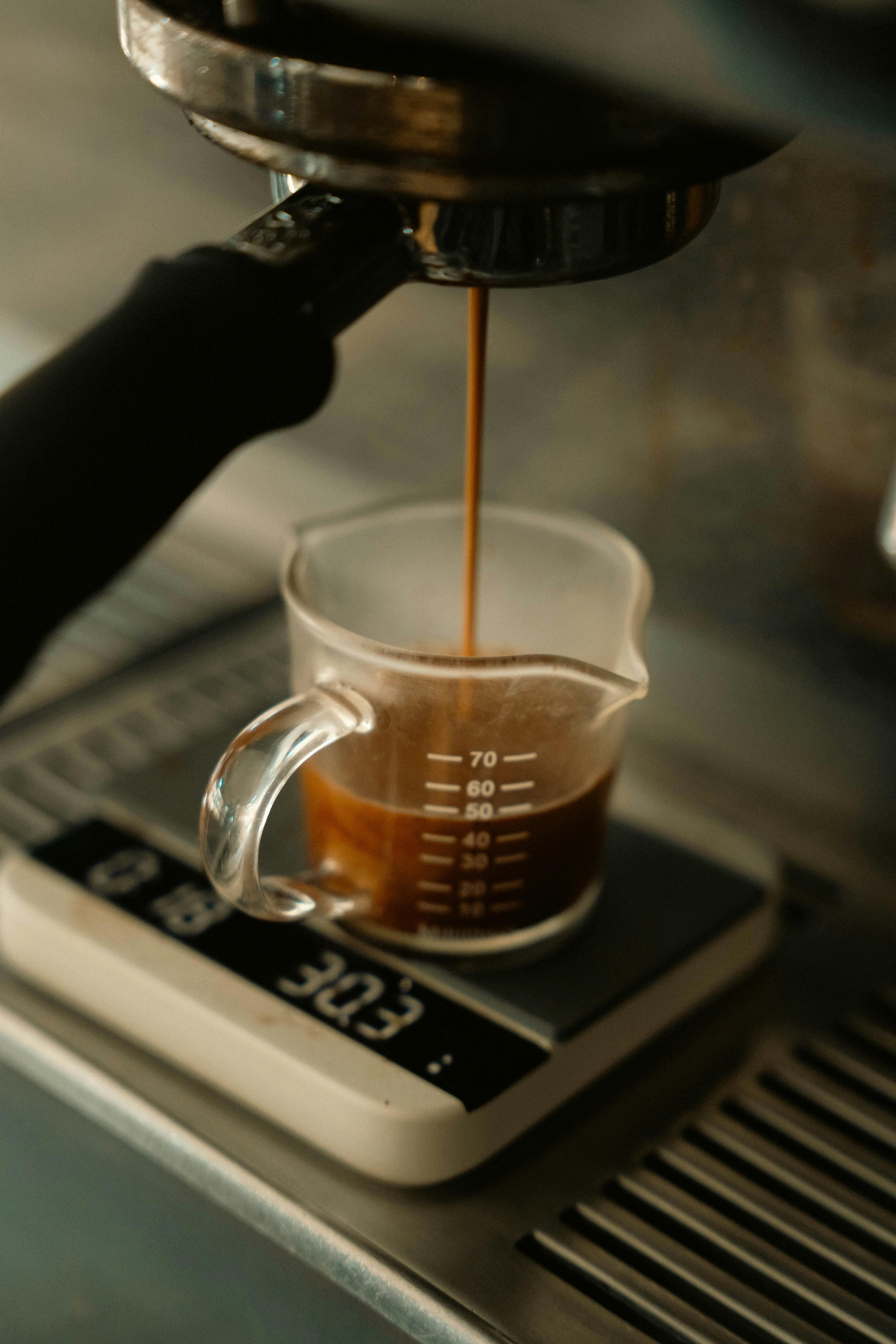 Espresso shot on scale showing grams and crema