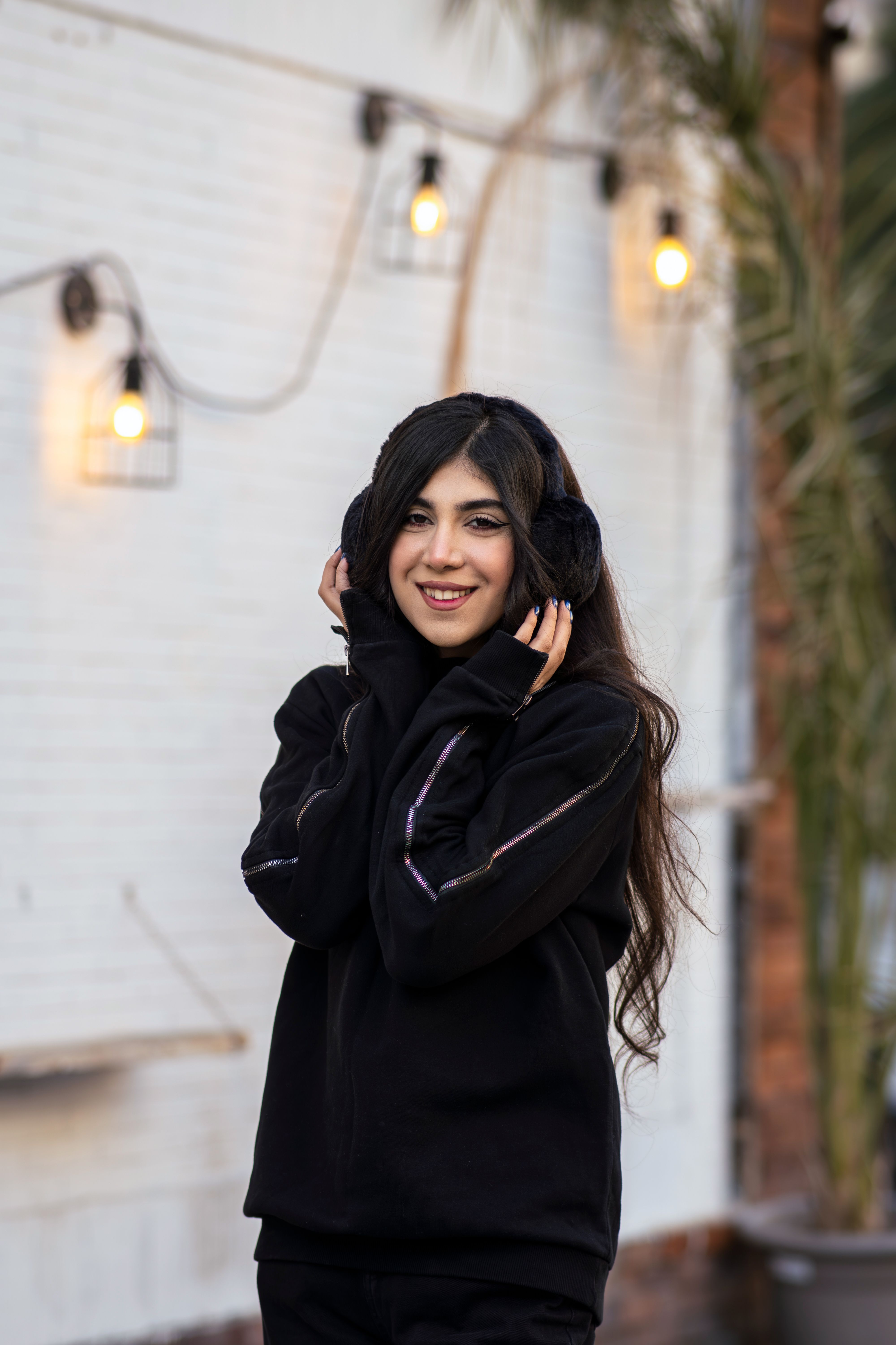 Portrait of a Smiling Woman in Tehran Outdoor Setting · Free Stock Photo