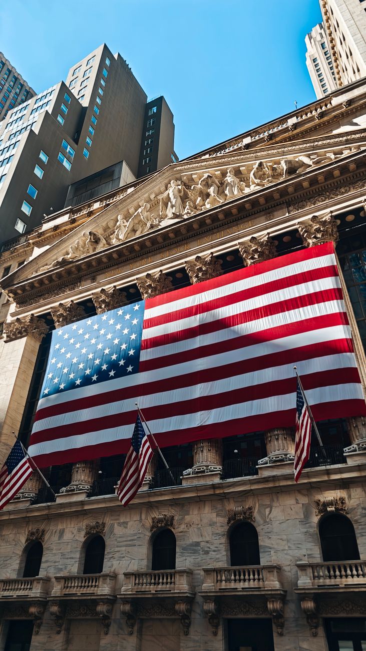 American flags hang across the New York Stock Exchange facade as investors prepare for major bank results.