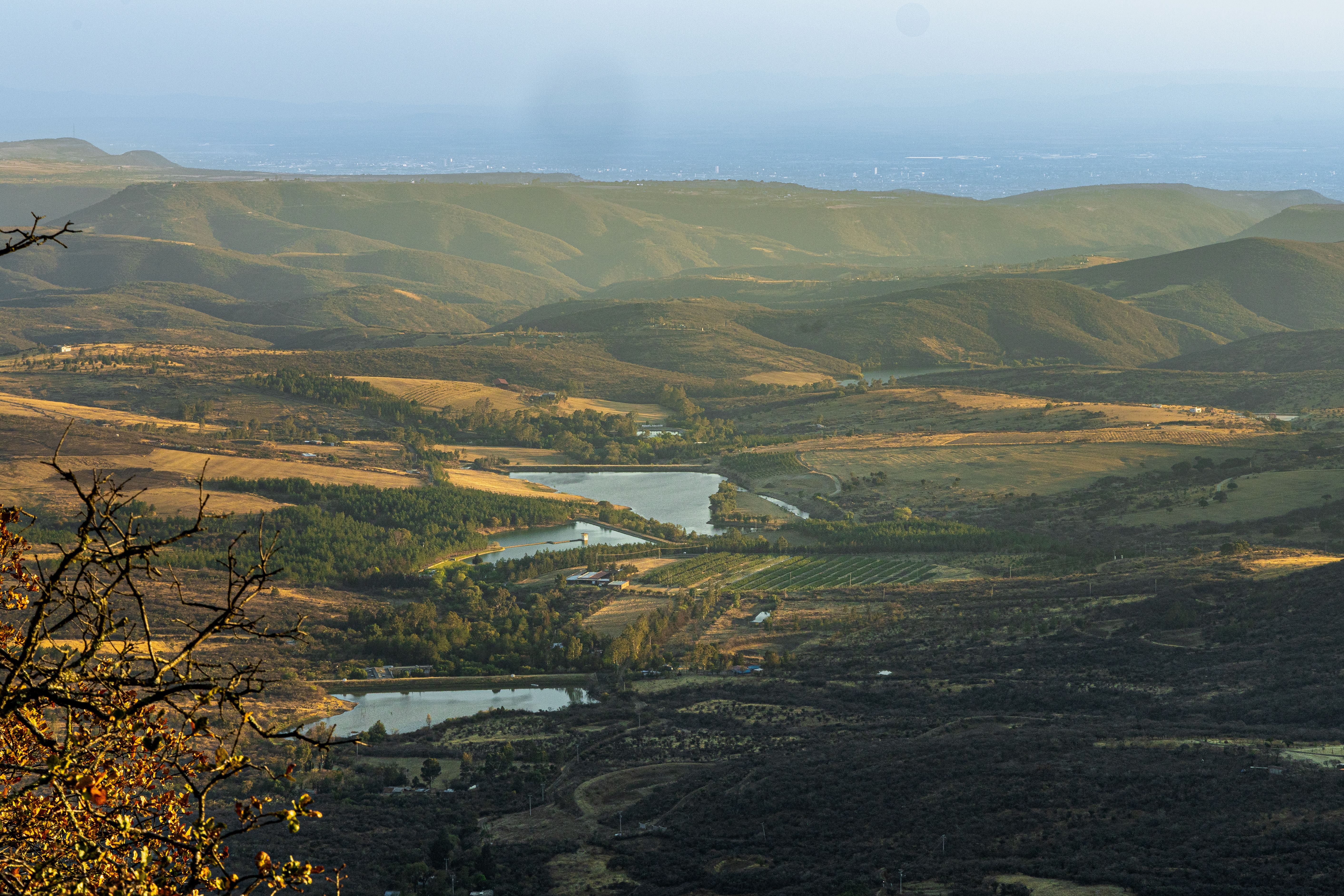 Granite domes of Paarl Rock above vineyards and the Berg River valley