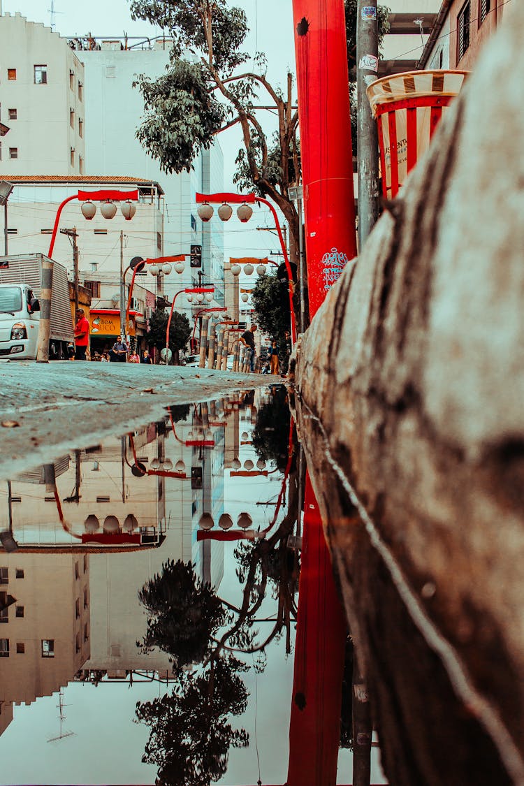 An Under Construction Road With Water