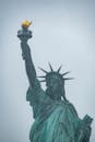 Statue of Liberty in Winter Mist with Golden Torch