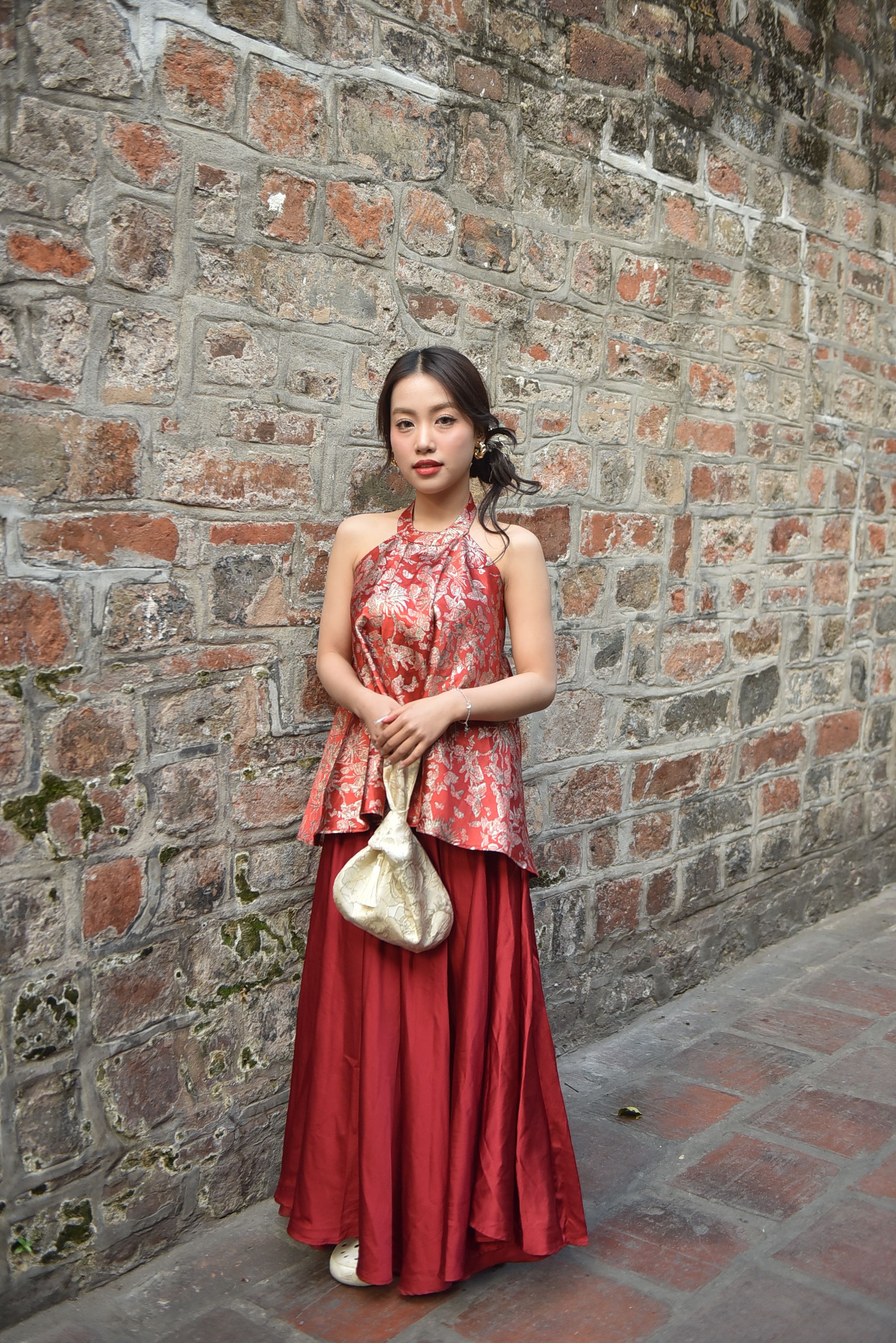 Young Woman Posing in Red Traditional Dress Outdoors · Free Stock Photo