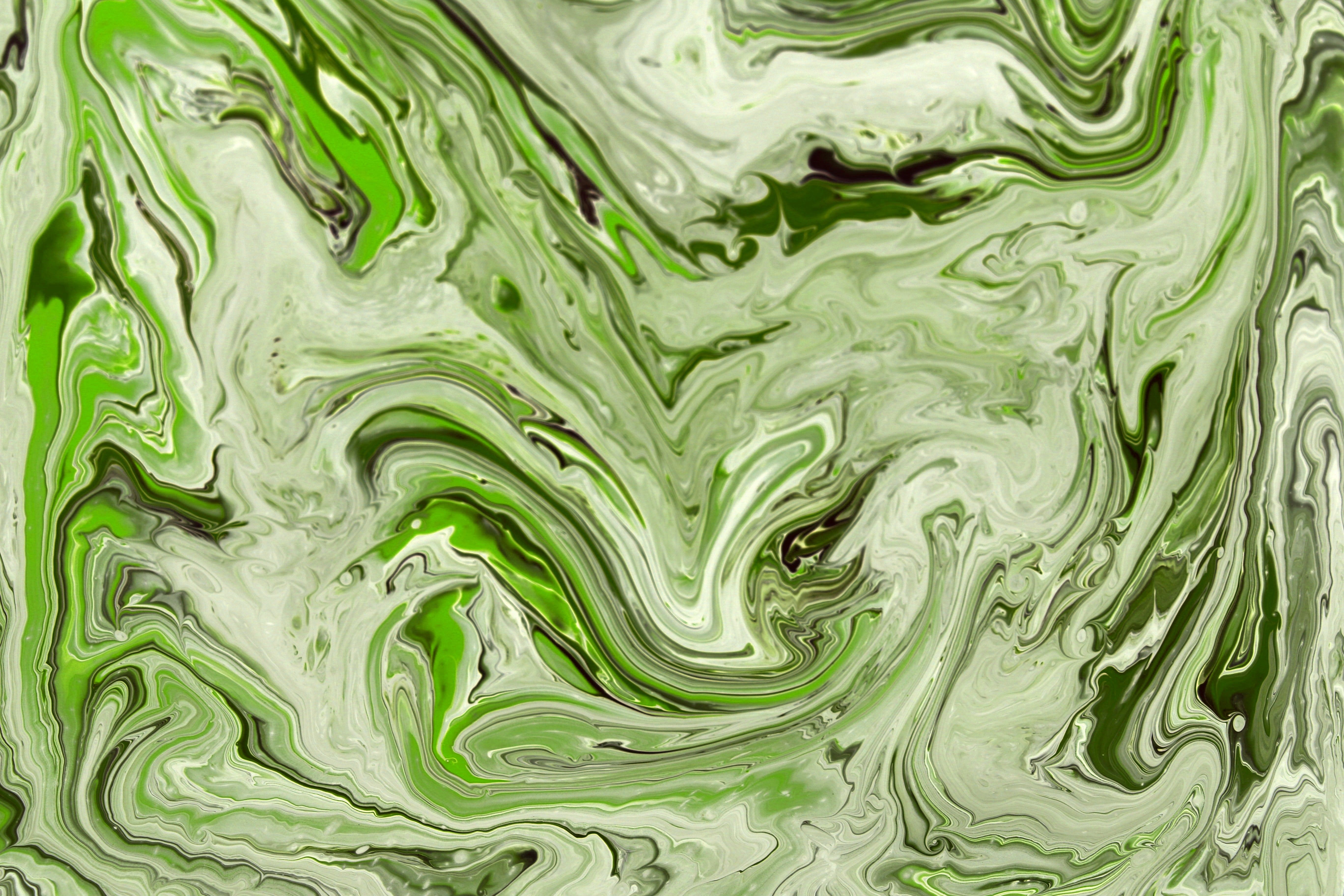 Vibrant Green Abstract Paint Swirl Art · Free Stock Photo