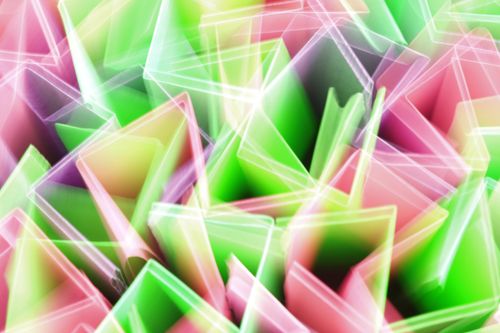 Free Vibrant abstract geometric shapes in motion with pink and green hues creating an energized effect. Stock Photo