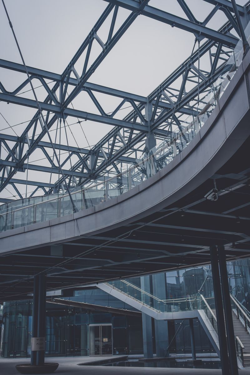 Architectural steel beams and glass inside a modern building