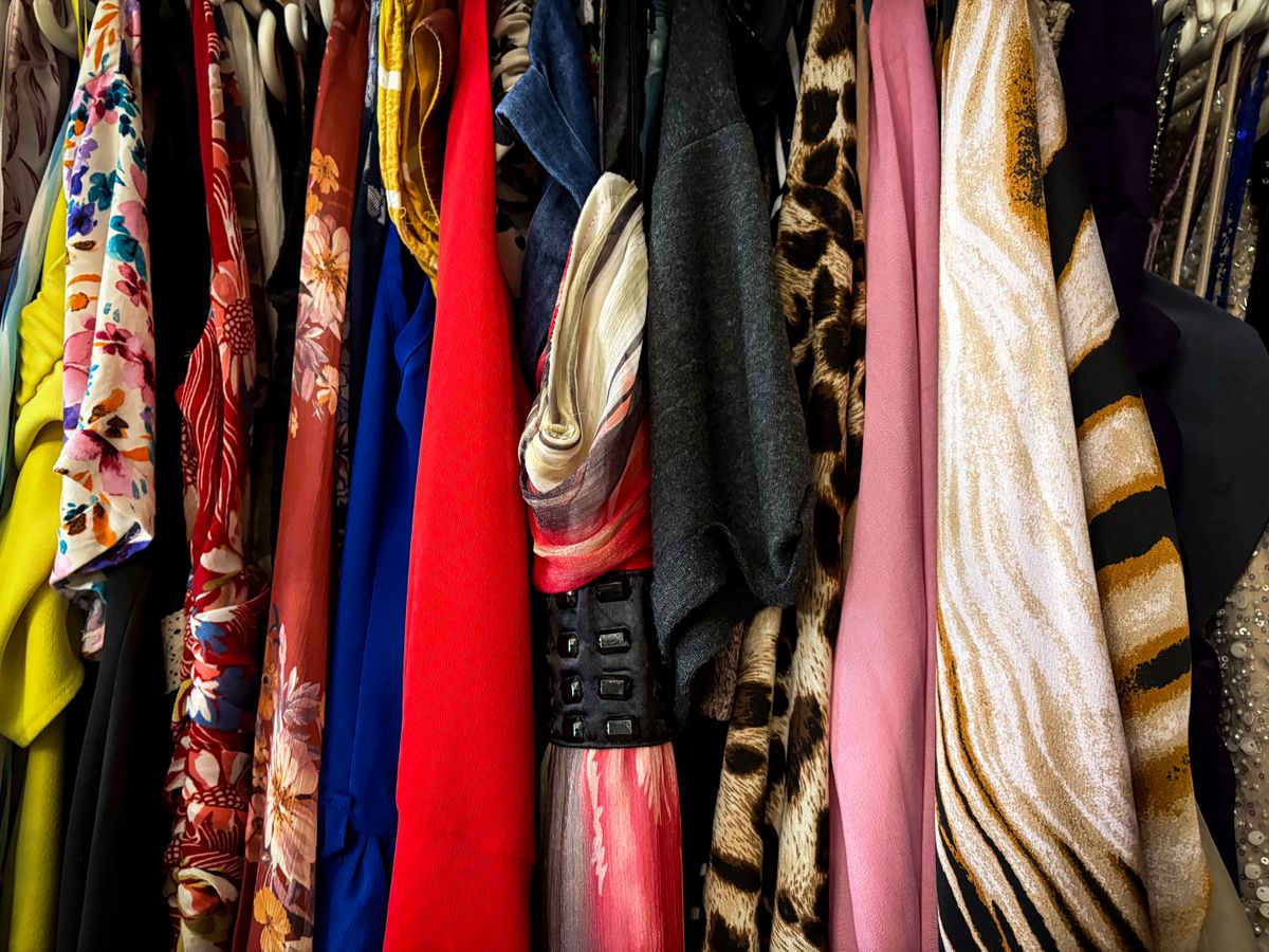 Rack of secondhand clothes on hangers