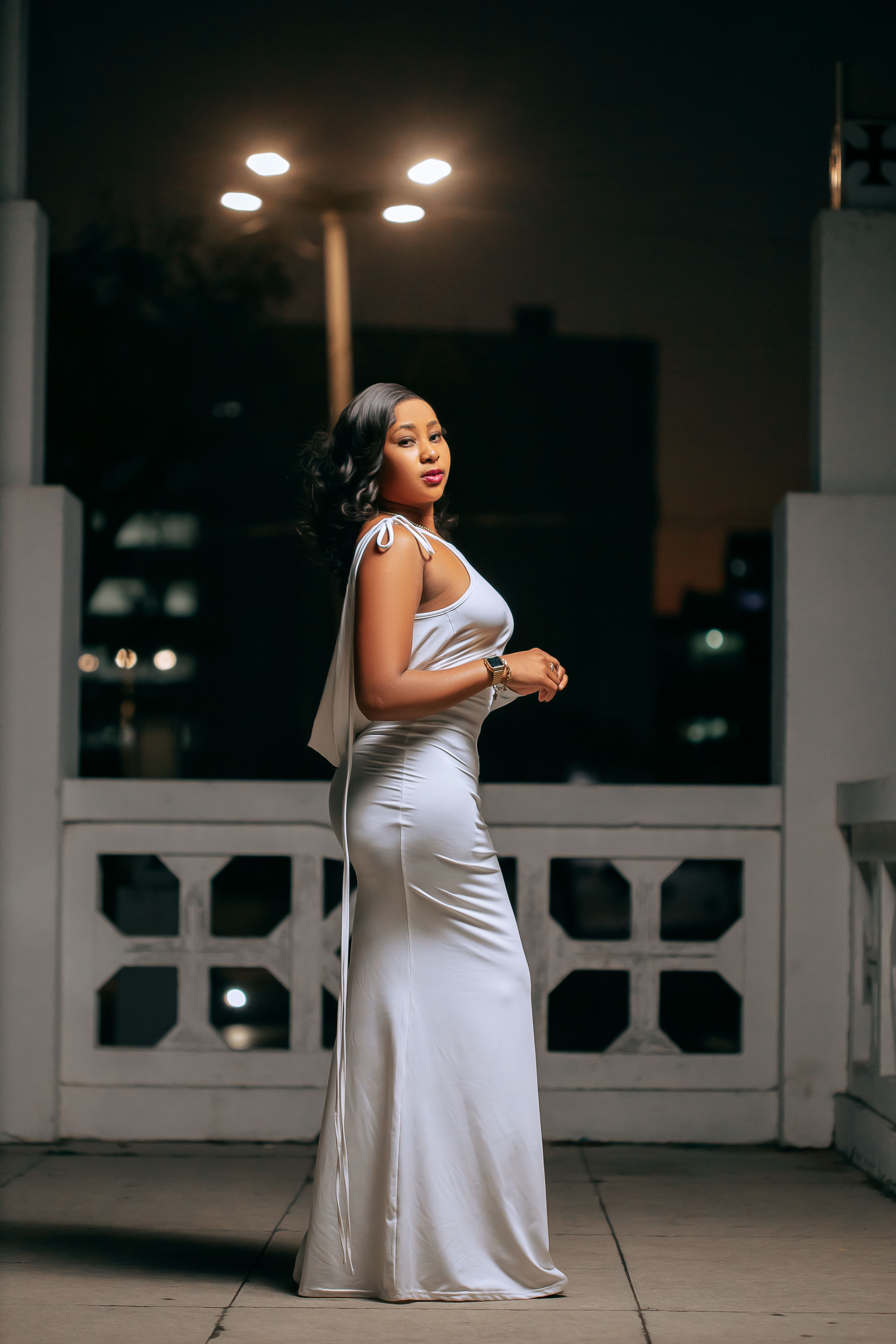 Elegant Woman in White Gown at Night · Free Stock Photo