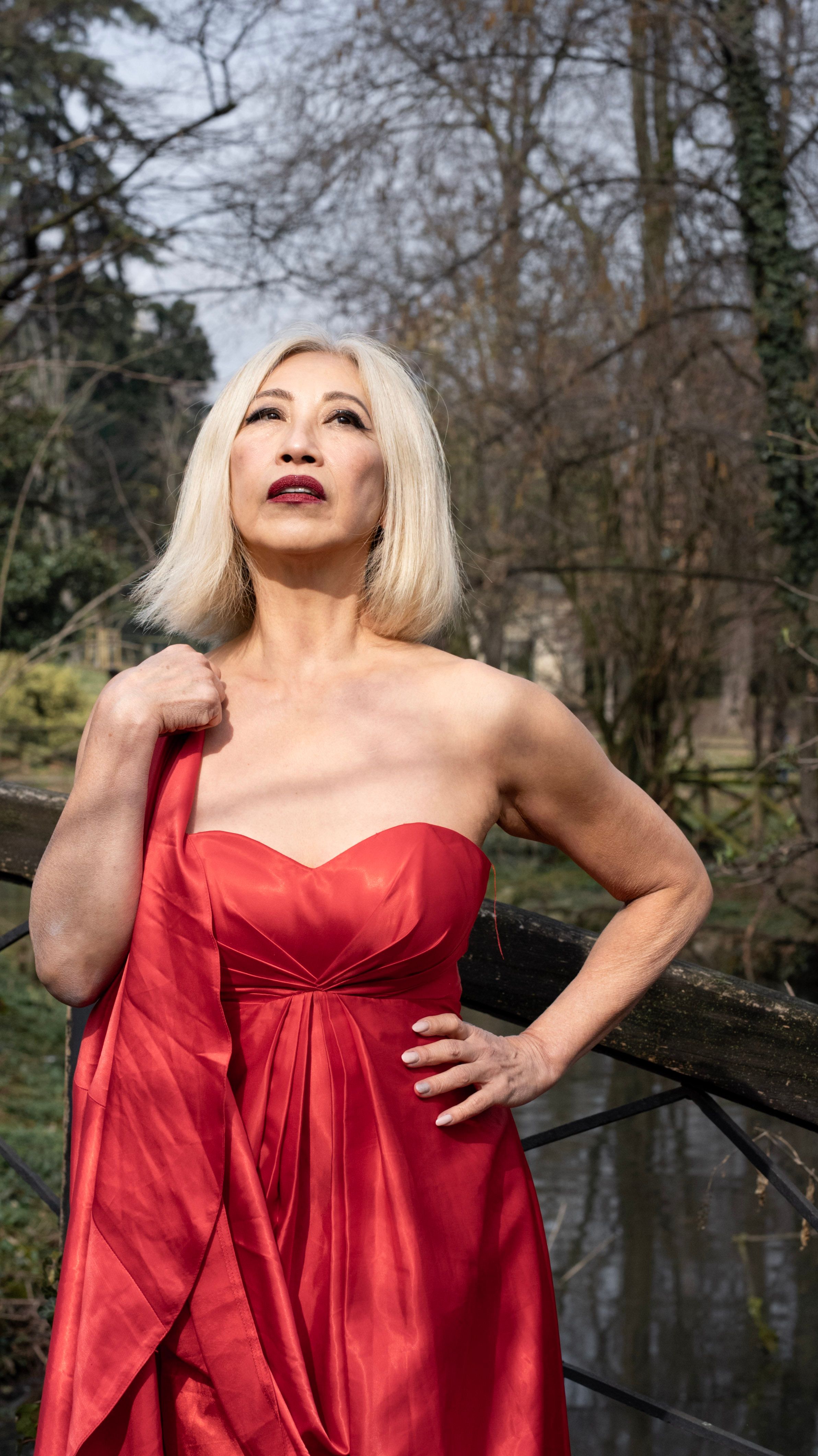 Elegant Woman in Red Dress Outdoors in Milan · Free Stock Photo