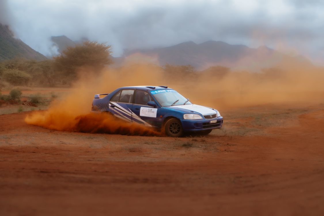 Sharpness Car Rally Dynamic Rally Car Drifting Through Dusty Terrain · Free Stock Photo