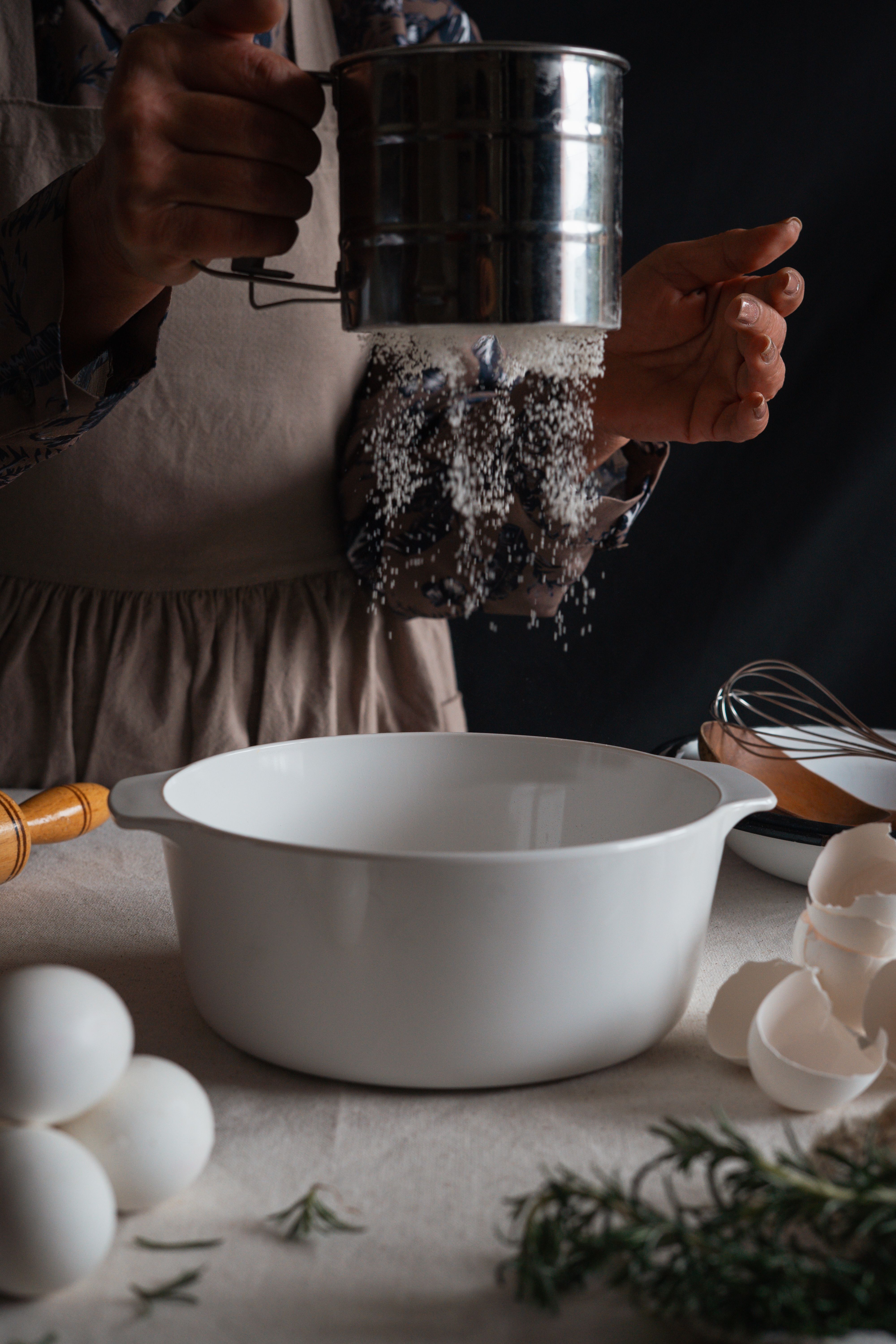 Home Baking Scene with Flour Sifter and Eggs · Free Stock Photo