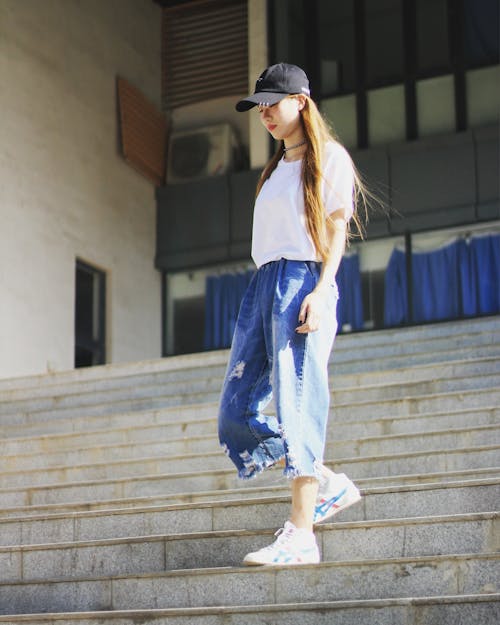 Woman Walking Down The Stairs