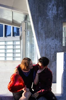 A couple sharing a loving moment with a heart balloon in Buenos Aires.