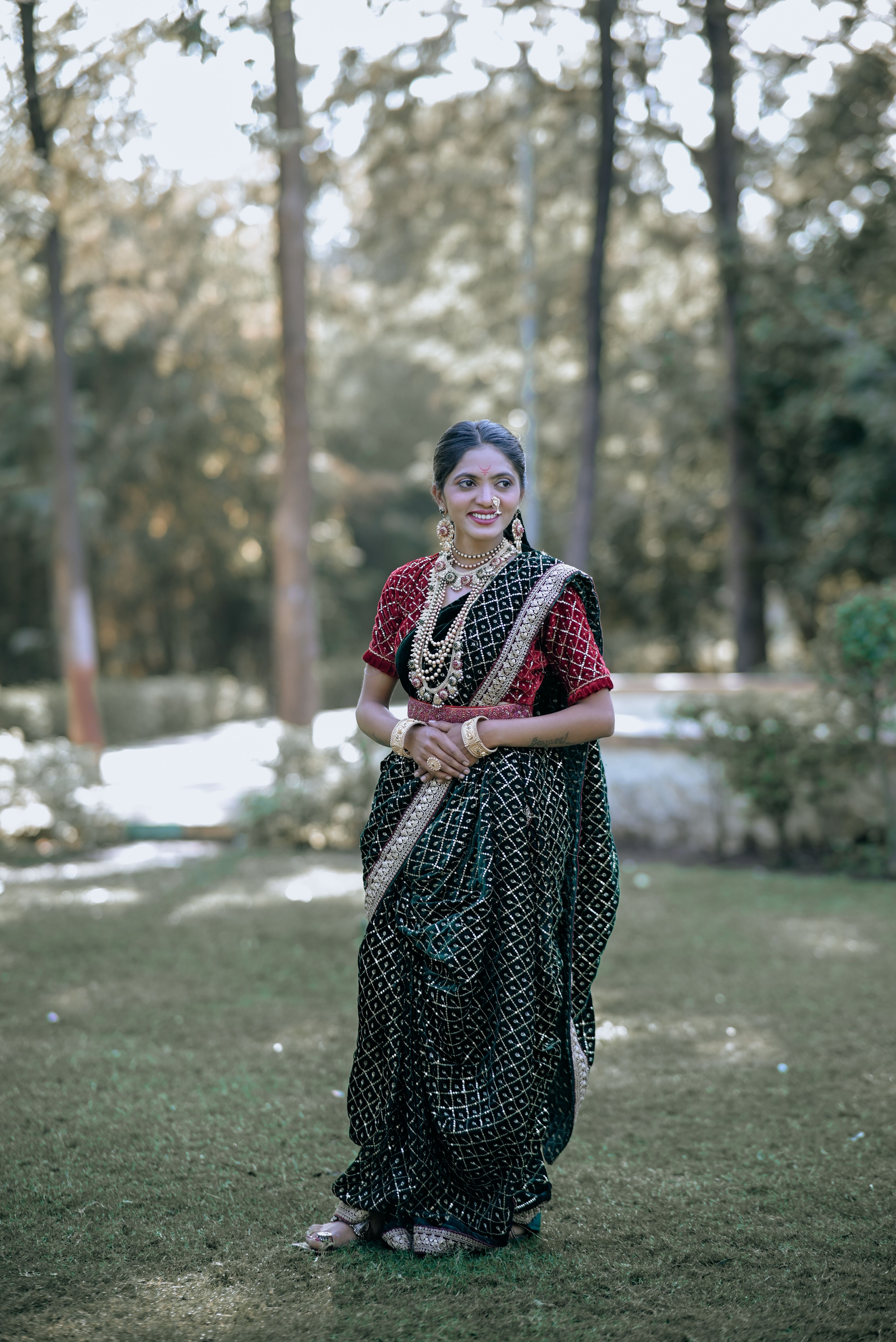 Elegant Woman in Traditional Indian Saree Outdoors · Free Stock Photo