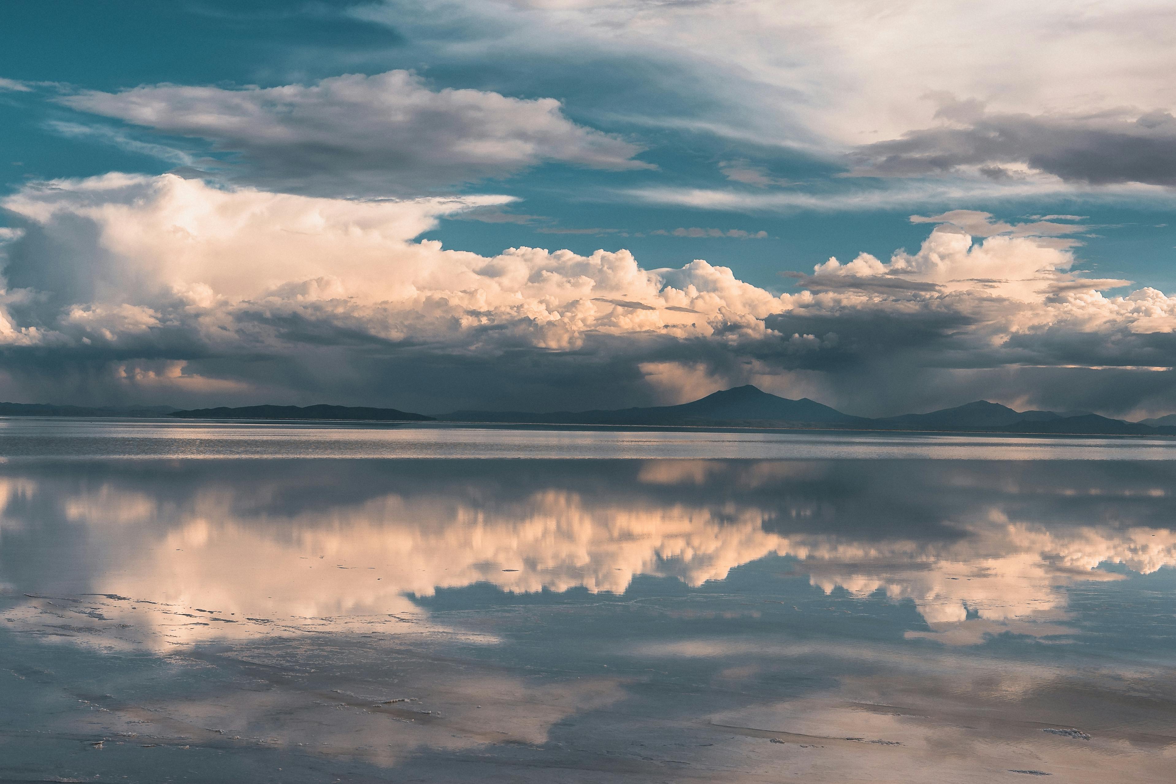 Salt flat mirror reflection in Salar de Uyuni - best off the beaten path travel destinations