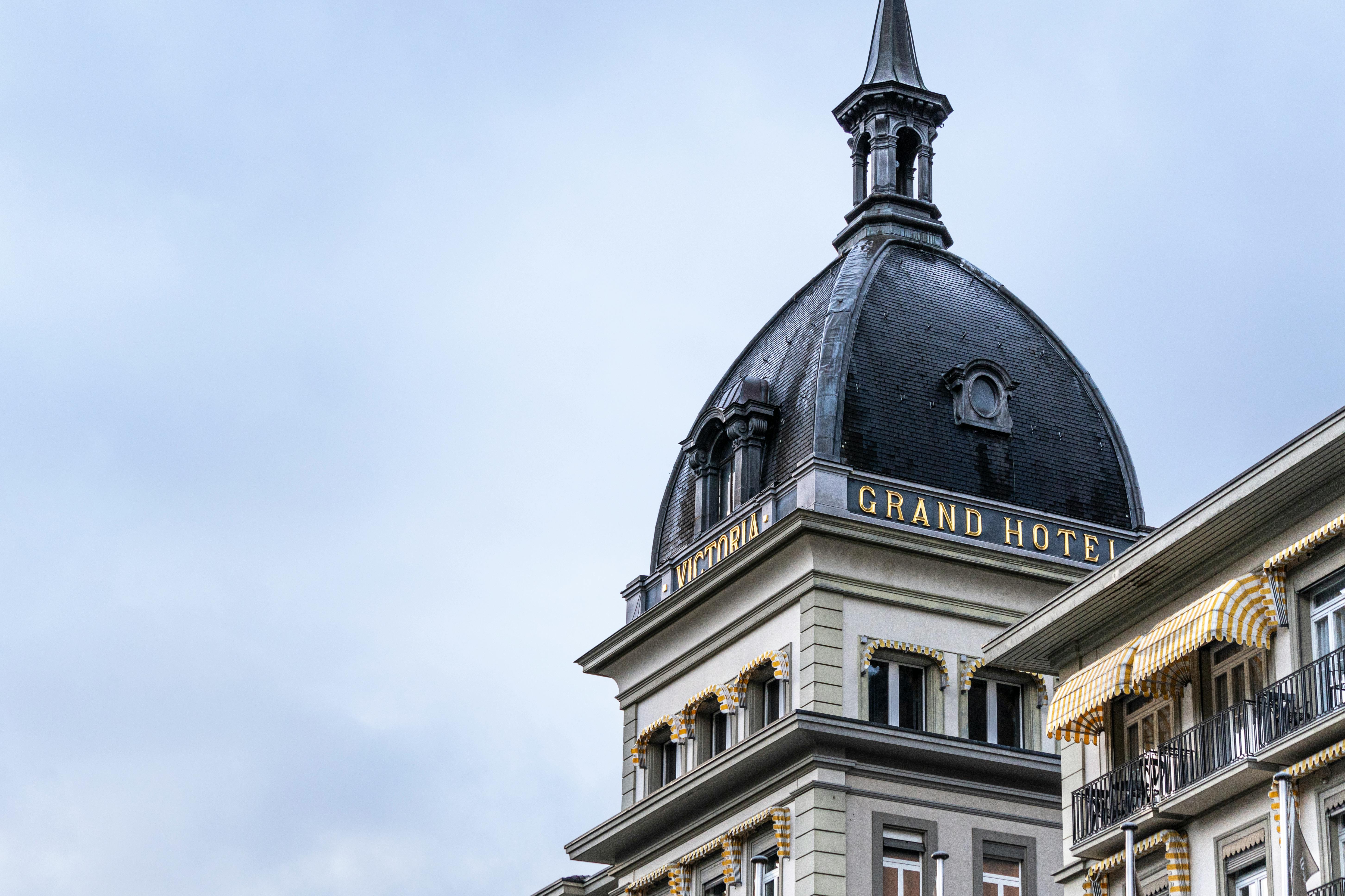 Elegant architectural details of the Victoria Jungfrau Grand Hotel in Interlaken, Switzerland.