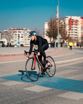Cyclist in Konya, Turkey racing on a road on a clear sunny day.