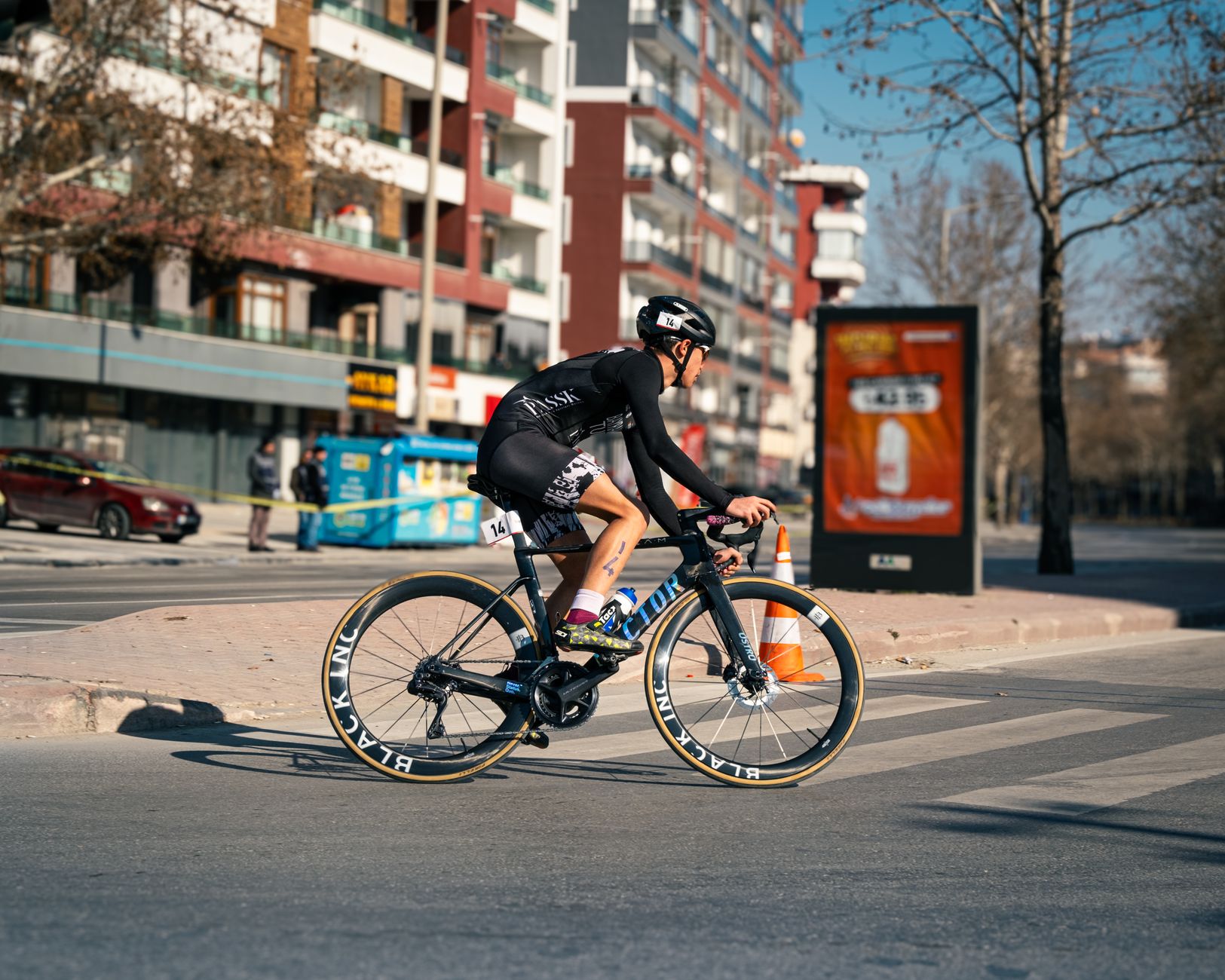 A cyclist participating in an outdoor race on the streets of Konya, Türkiye.