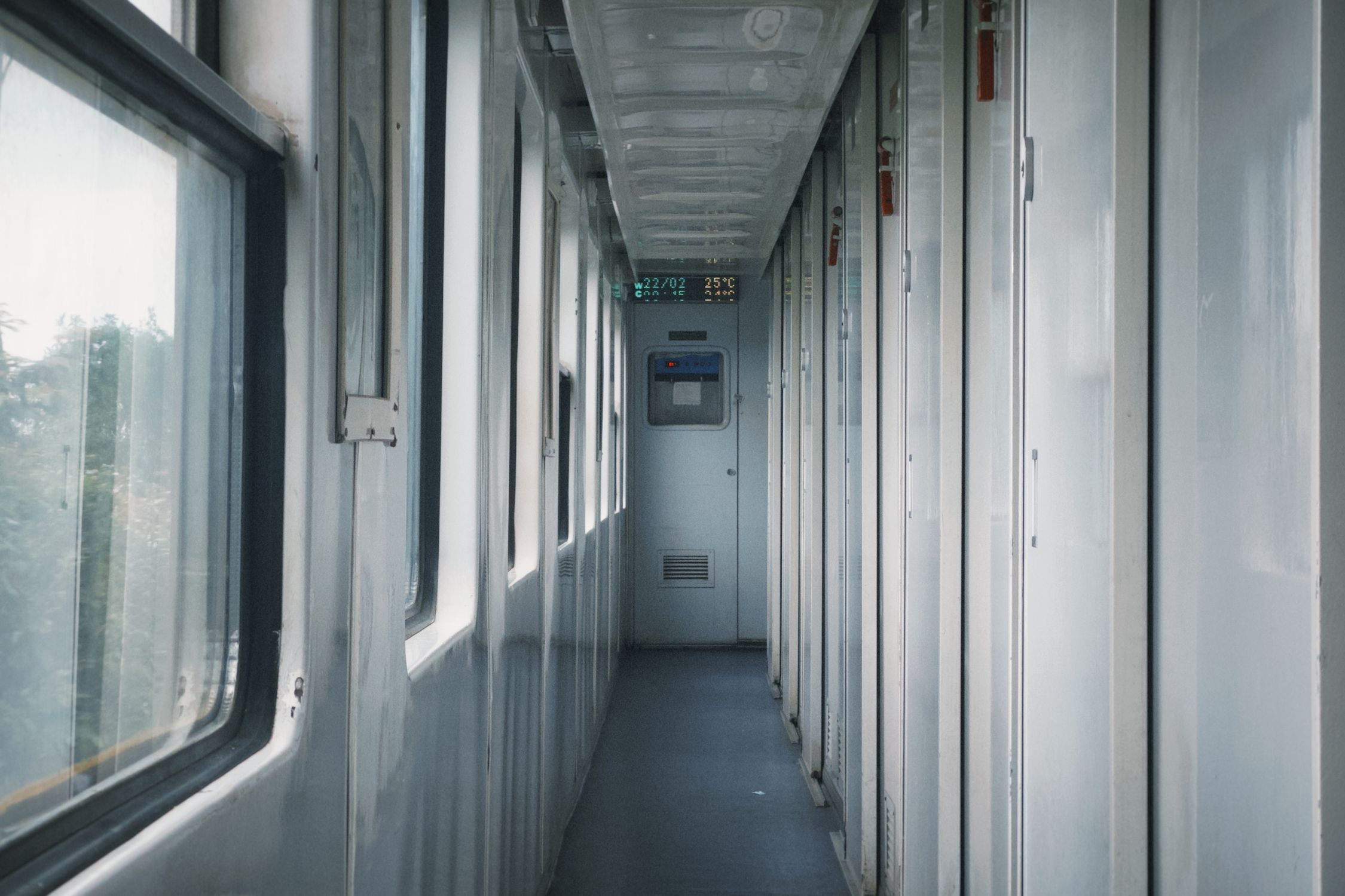Narrow Train Corridor With Doors And Windows Free Stock Photo narrow-train-corridor-with-doors-and-windows-free-stock-photo