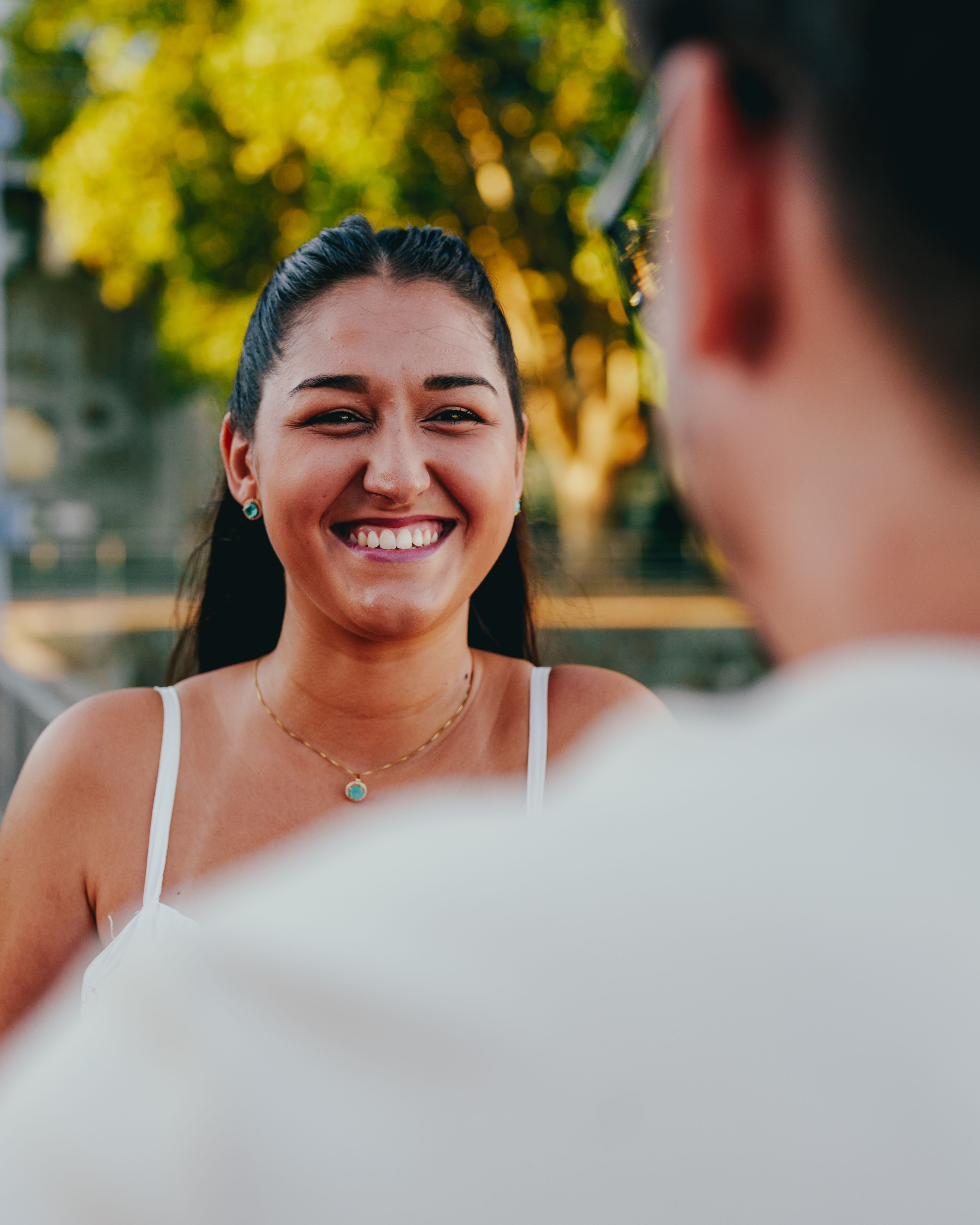 Smiling Woman Outdoors in Buenos Aires Park · Free Stock Photo