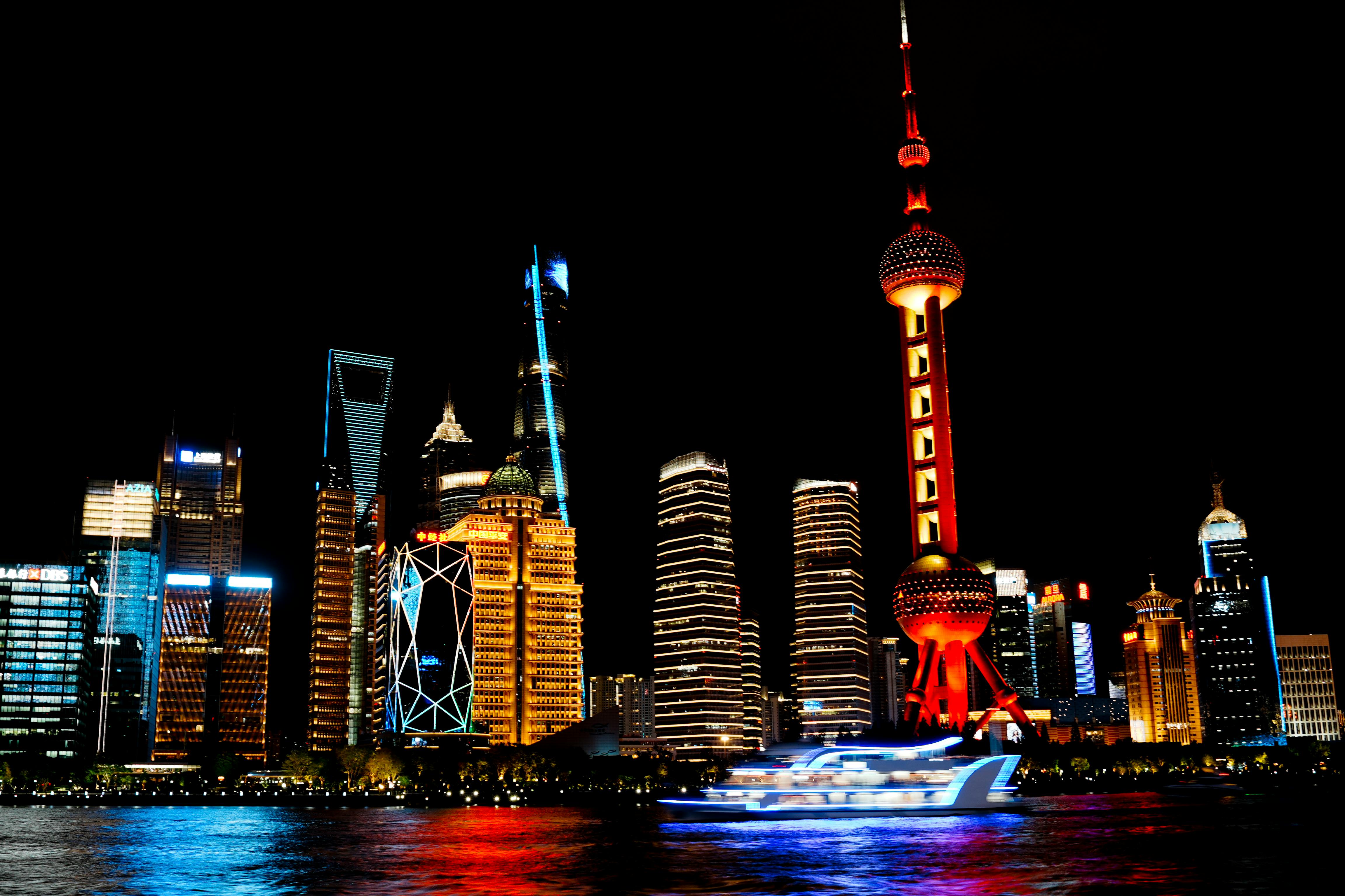 vibrant shanghai skyline at night with oriental pearl tower