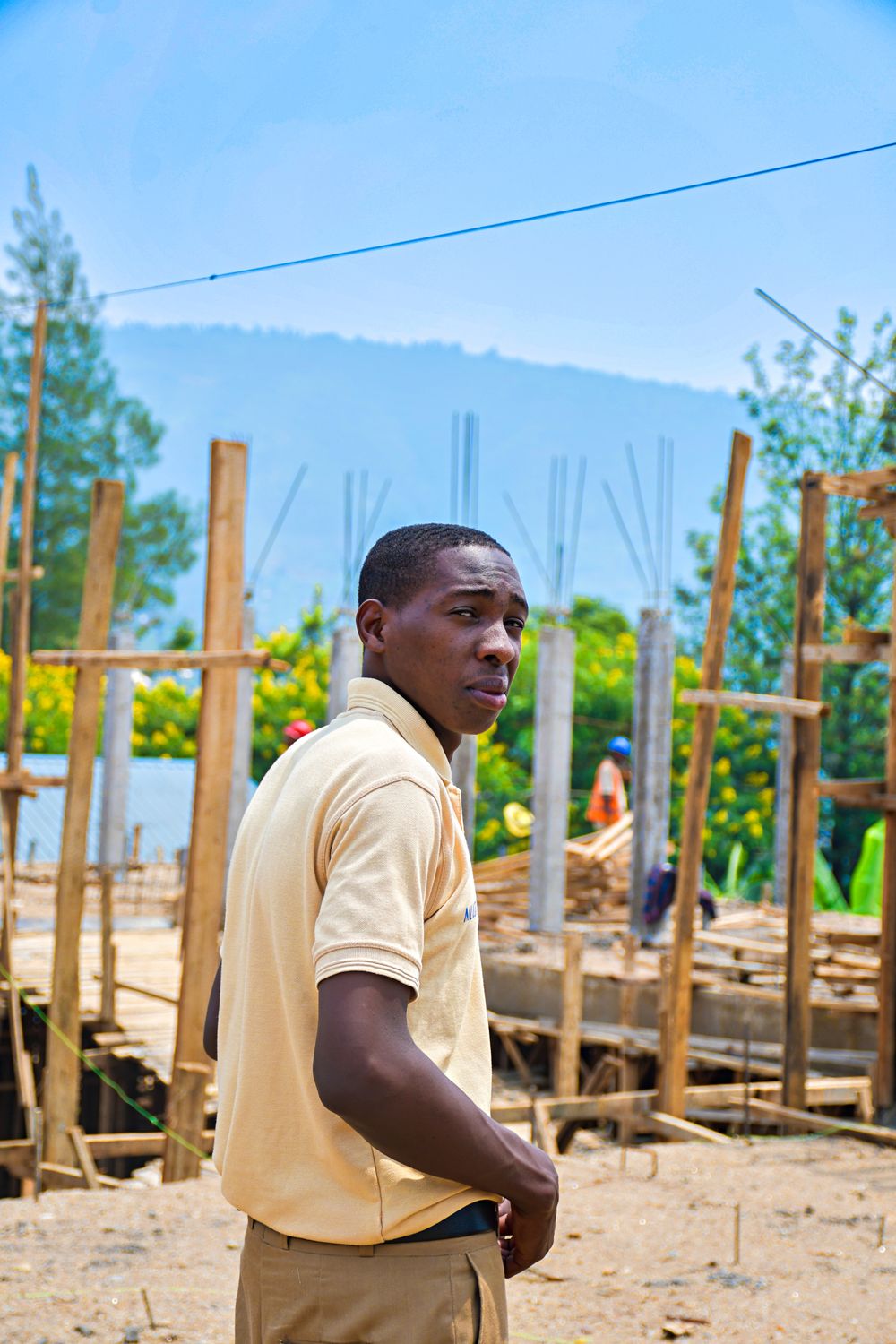 A young man at a construction site in Rwanda