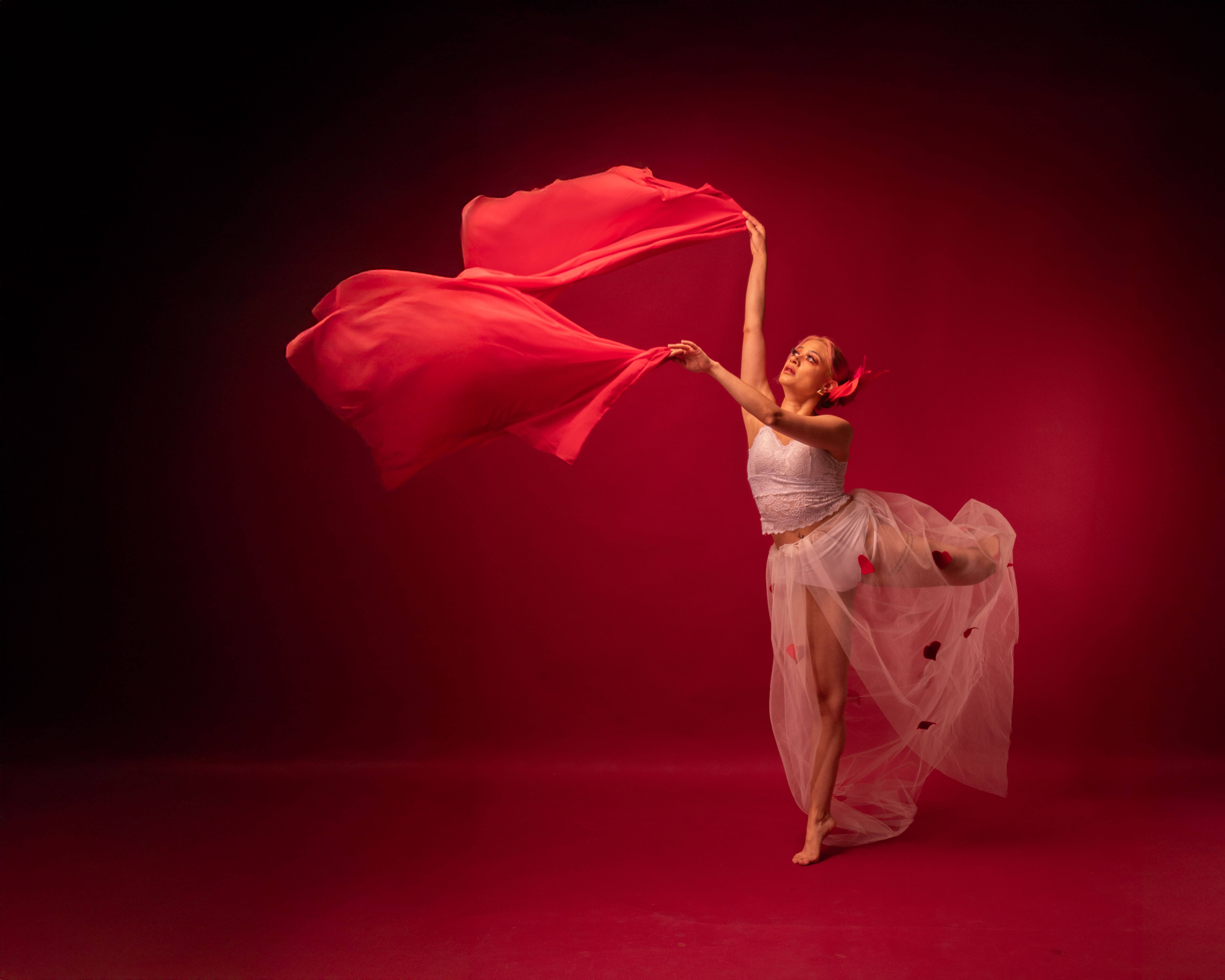 Elegant Ballet Dancer in Red Performance · Free Stock Photo