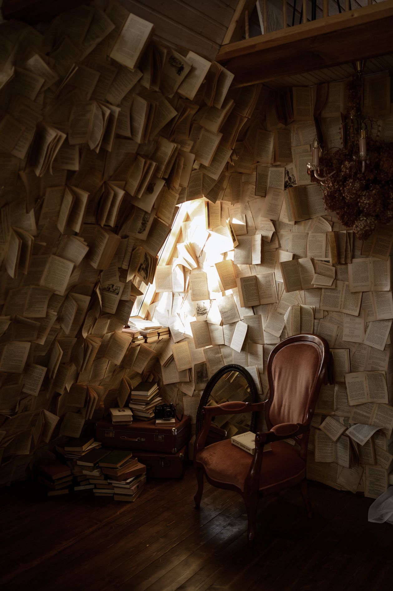 Cozy reading nook with books on shelves and natural light