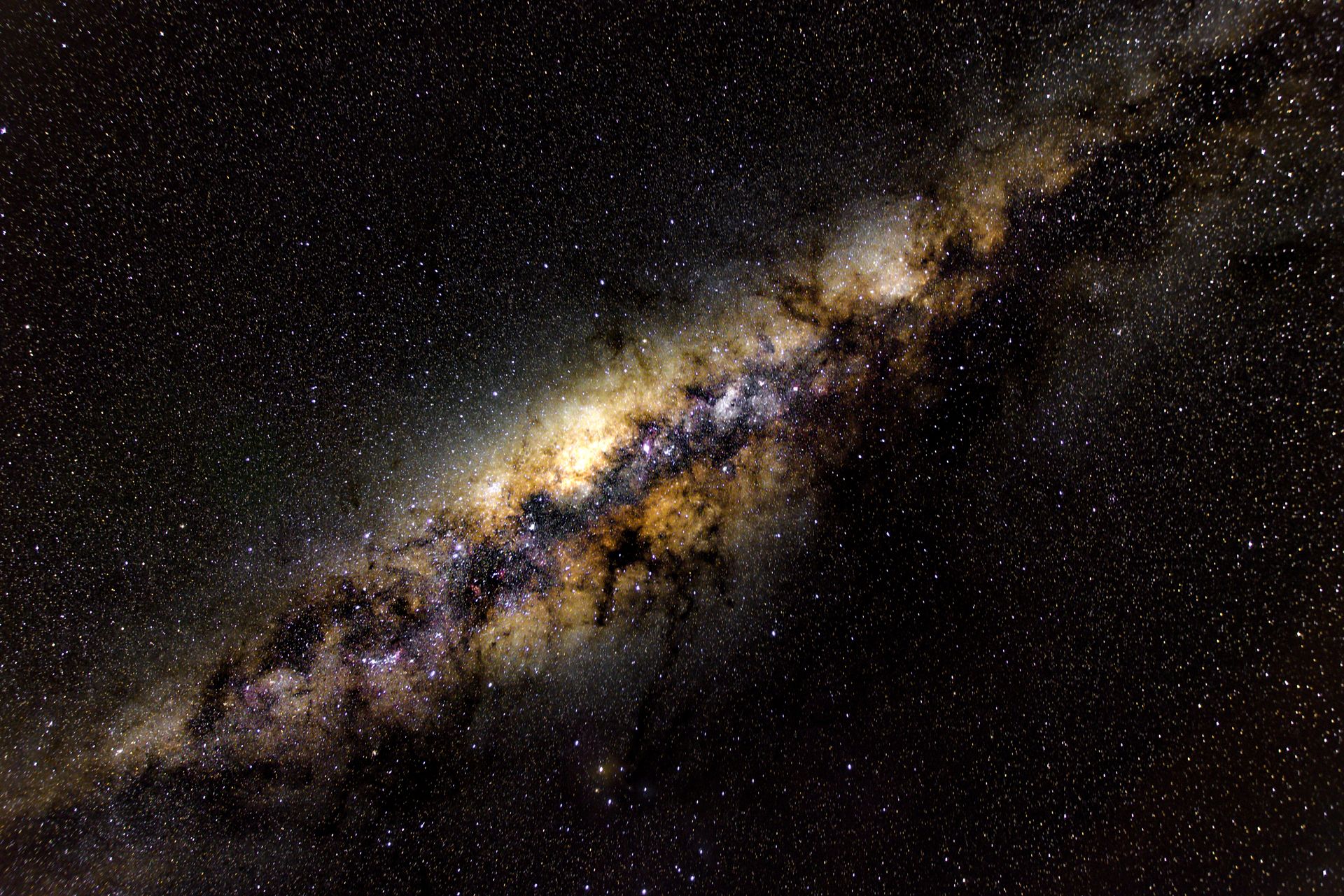 A breathtaking view of the Milky Way galaxy showcasing its vibrant star formation and cosmic dust clouds.