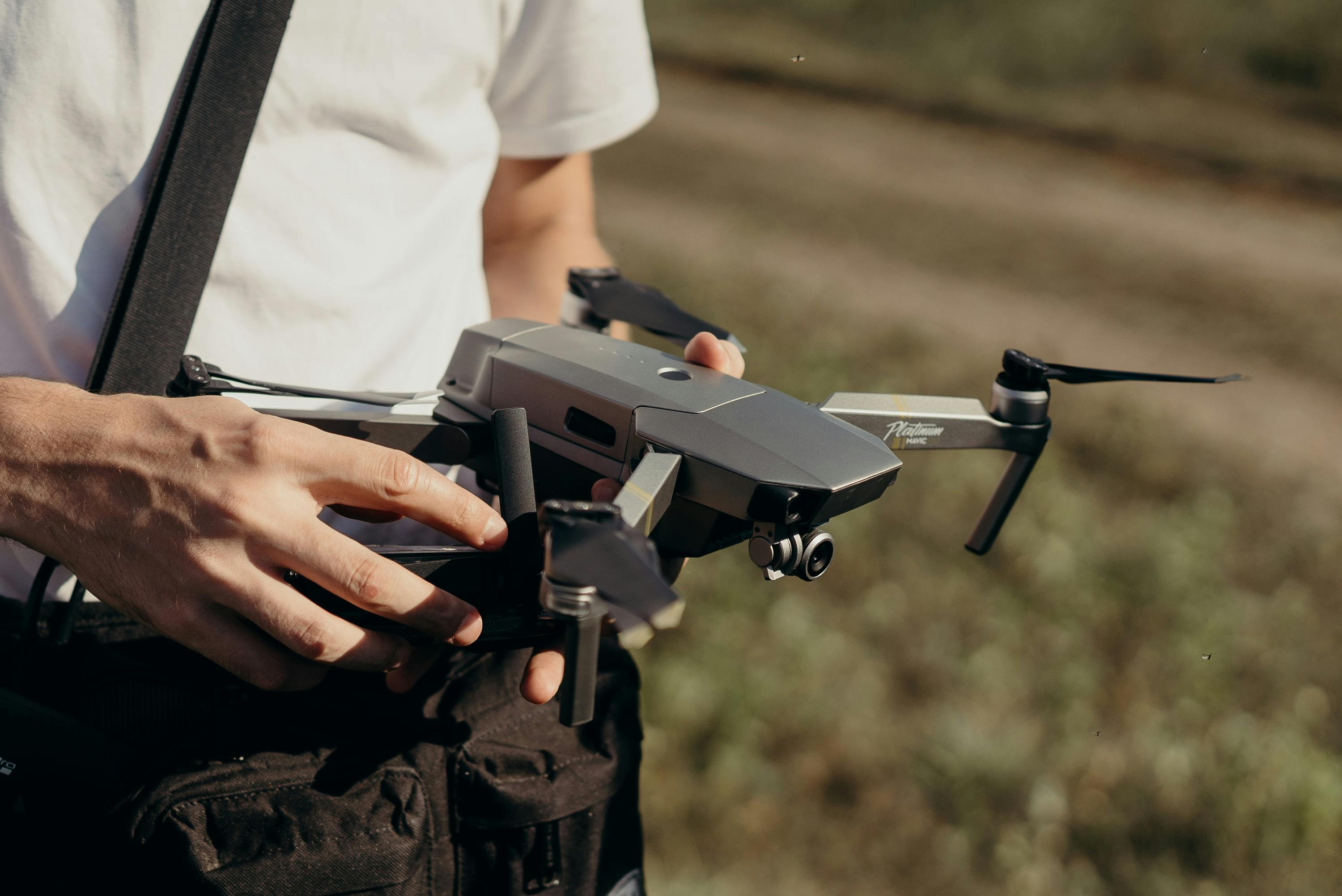 Person Holding Dji Mavic Drone · Free Stock Photo