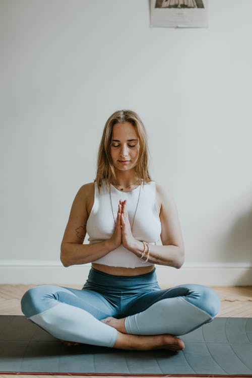 Free Woman Doing Yoga Inside A Room Stock Photo