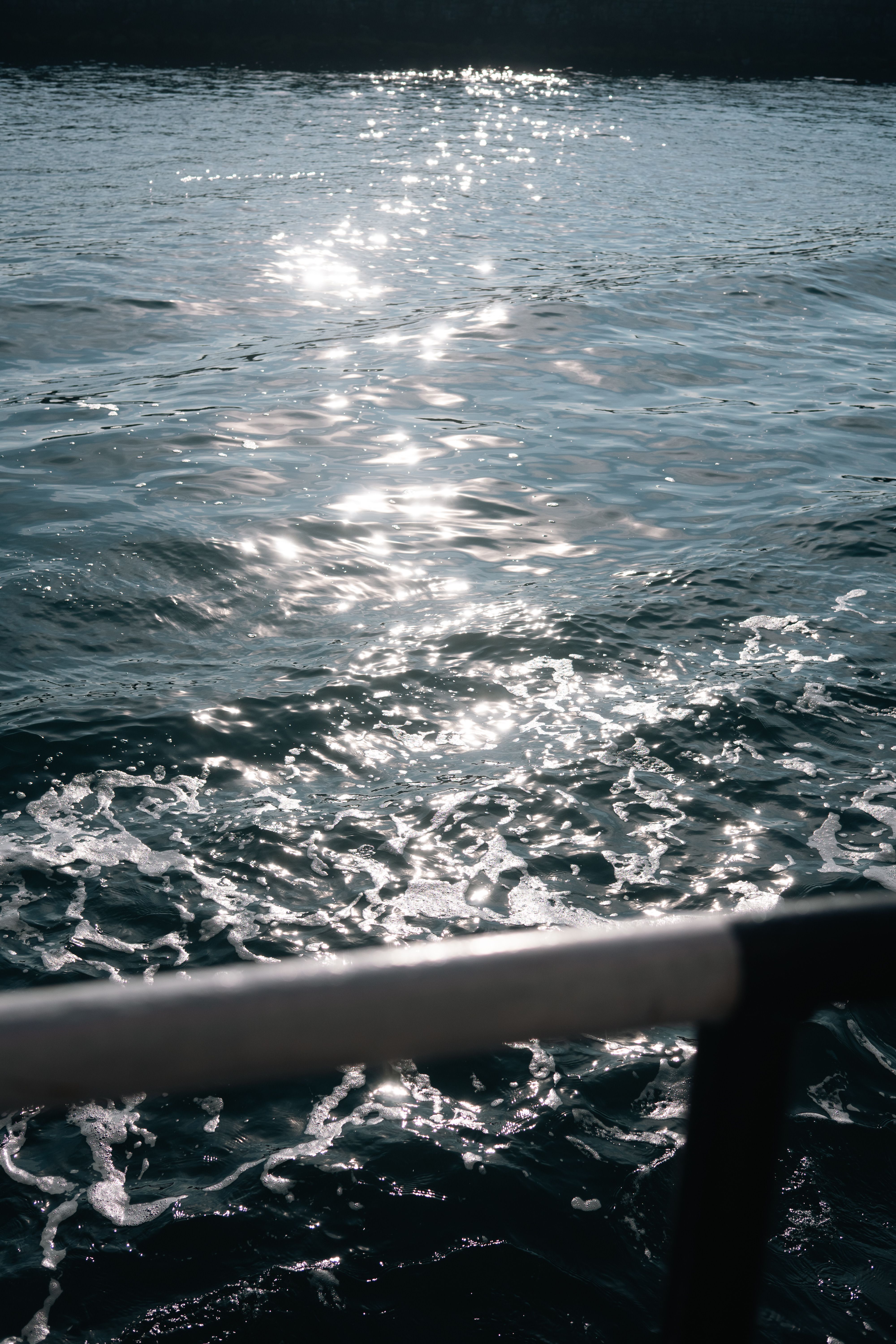 Sparkling Sunlight on Ocean Water Surface · Free Stock Photo