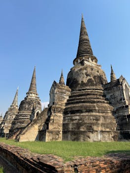 Majestic view of historic stupas at Wat Phra Si Sanphet, Ayutthaya.