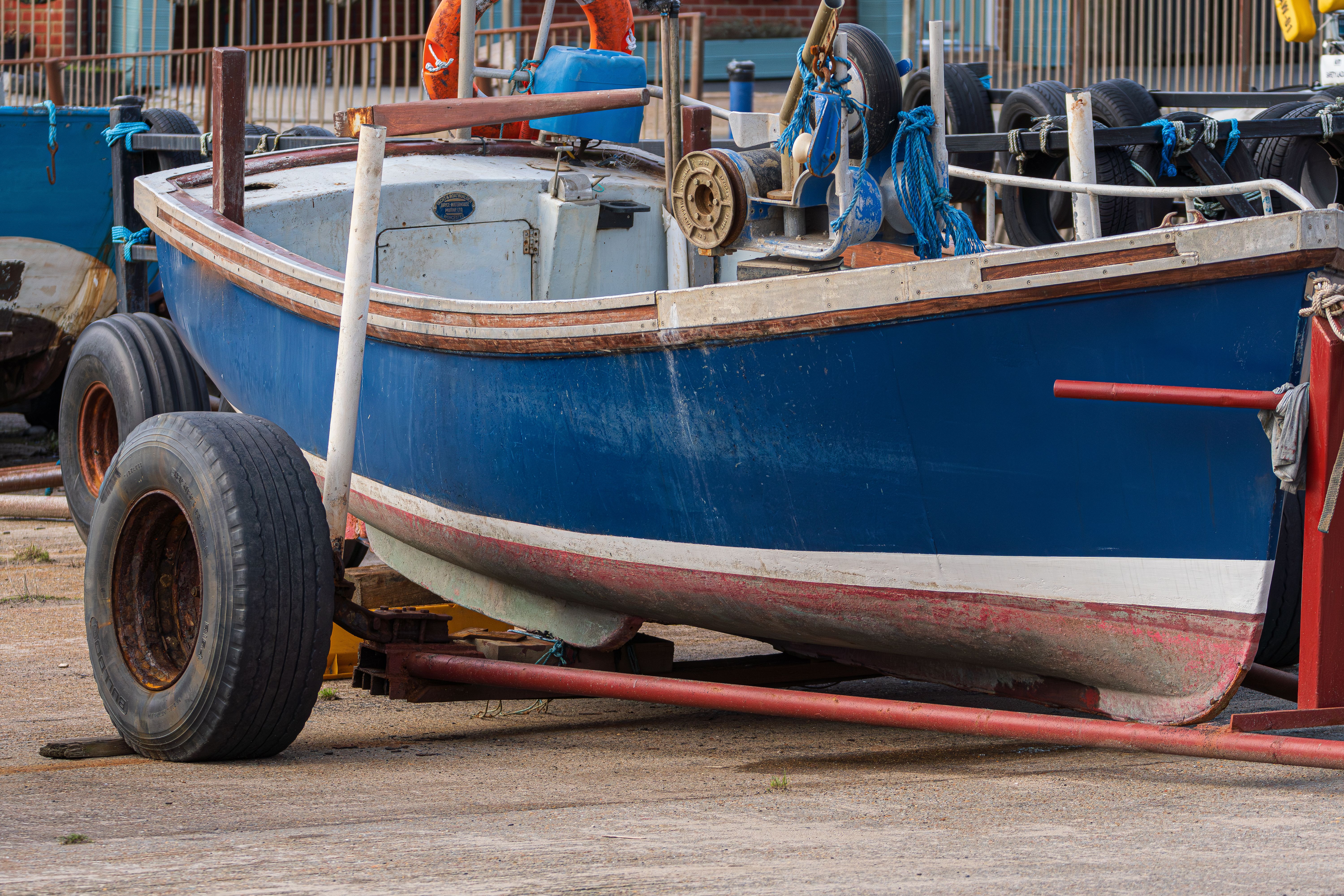 Detailed view of a fishing boat on a trailer in Newbiggin-by-the-Sea, UK.