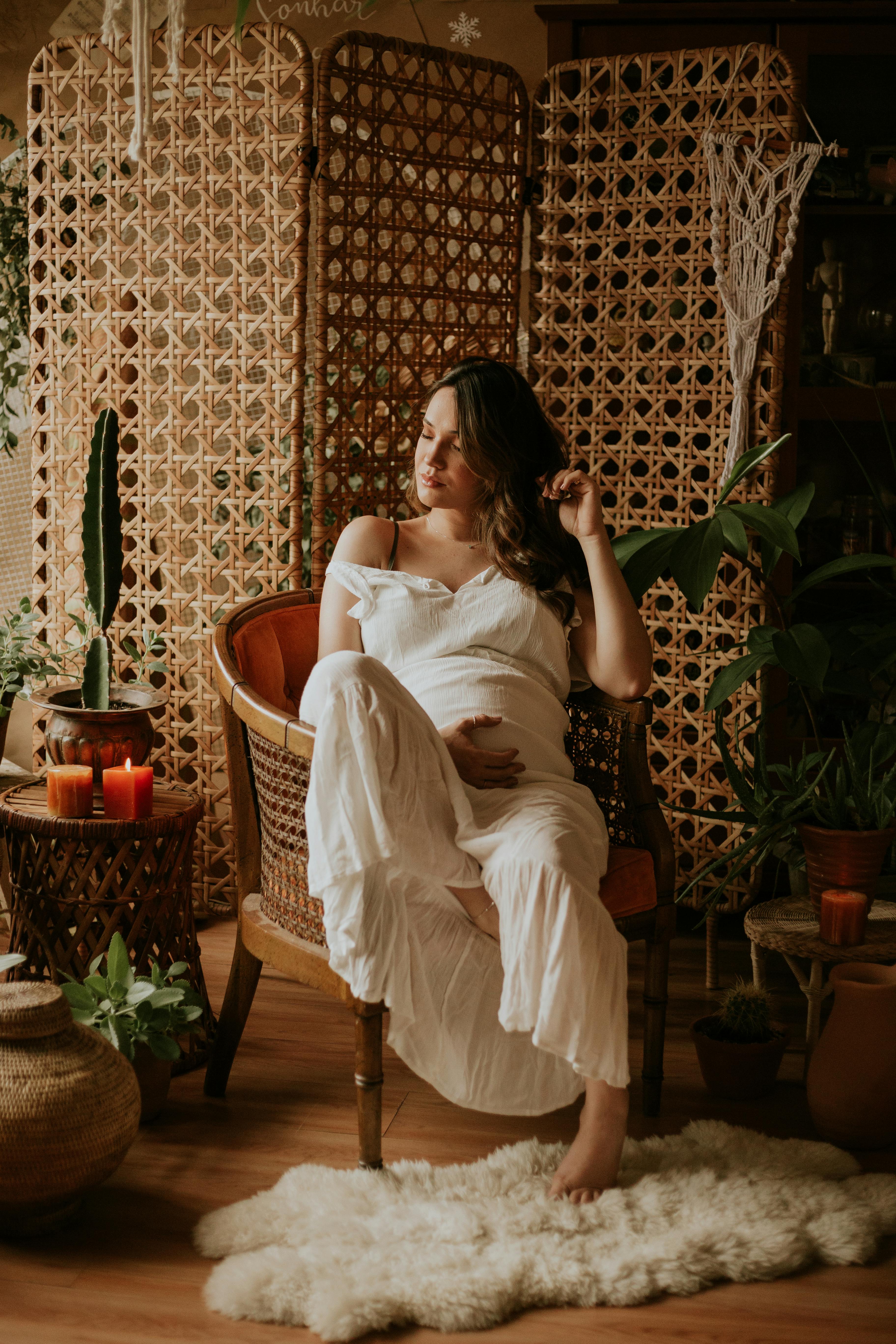 Woman Sitting on Sofa Chair · Free Stock Photo