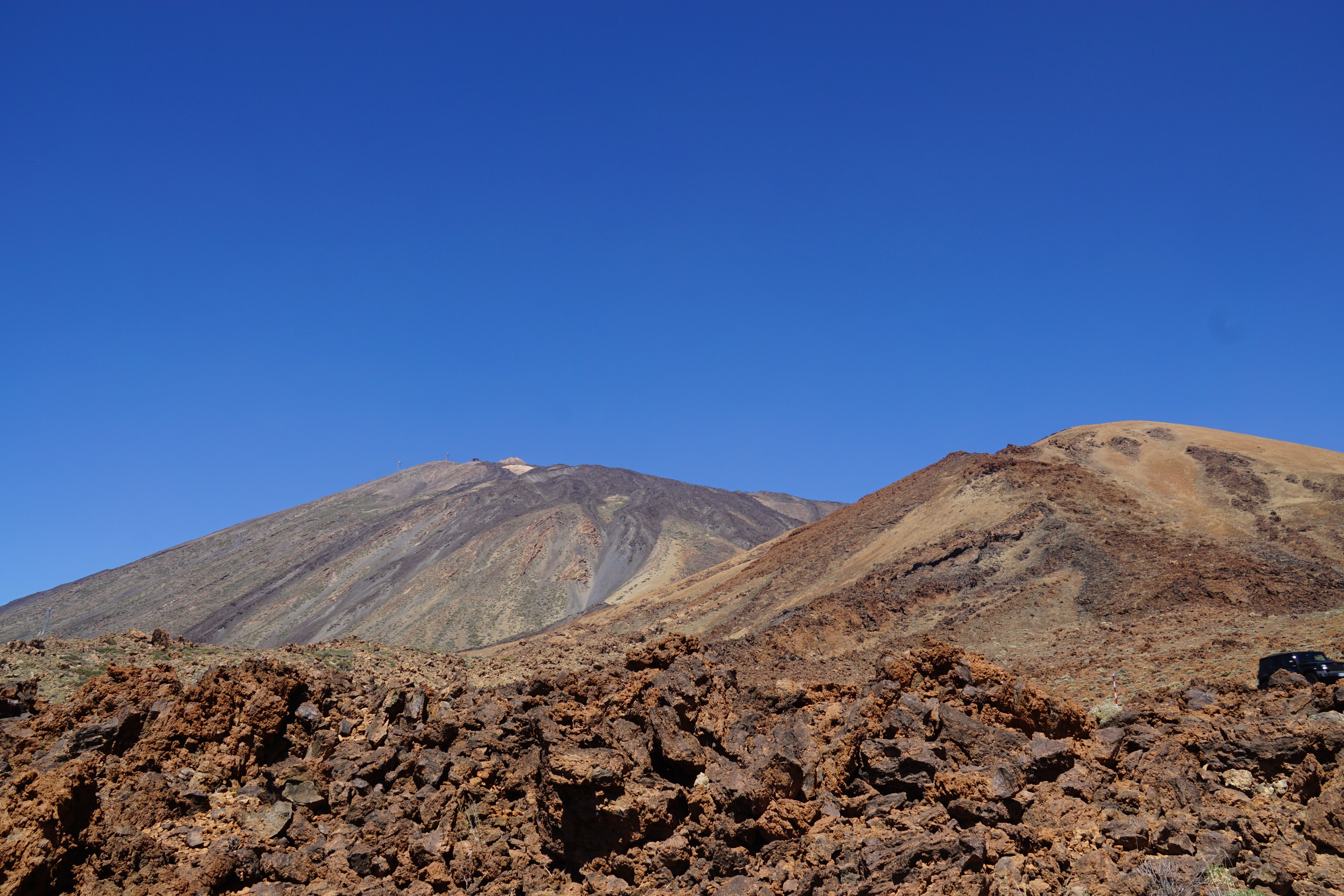 Teide National Park scenic landscape with volcanic rocks and Mount Teide in the background