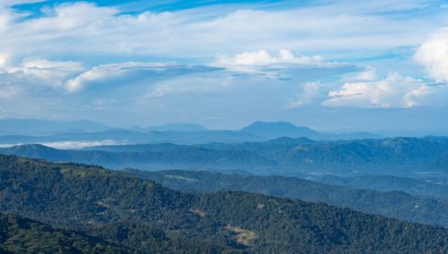Free Expansive view of lush mountains in Sri Lanka with a clear blue sky. Stock Photo