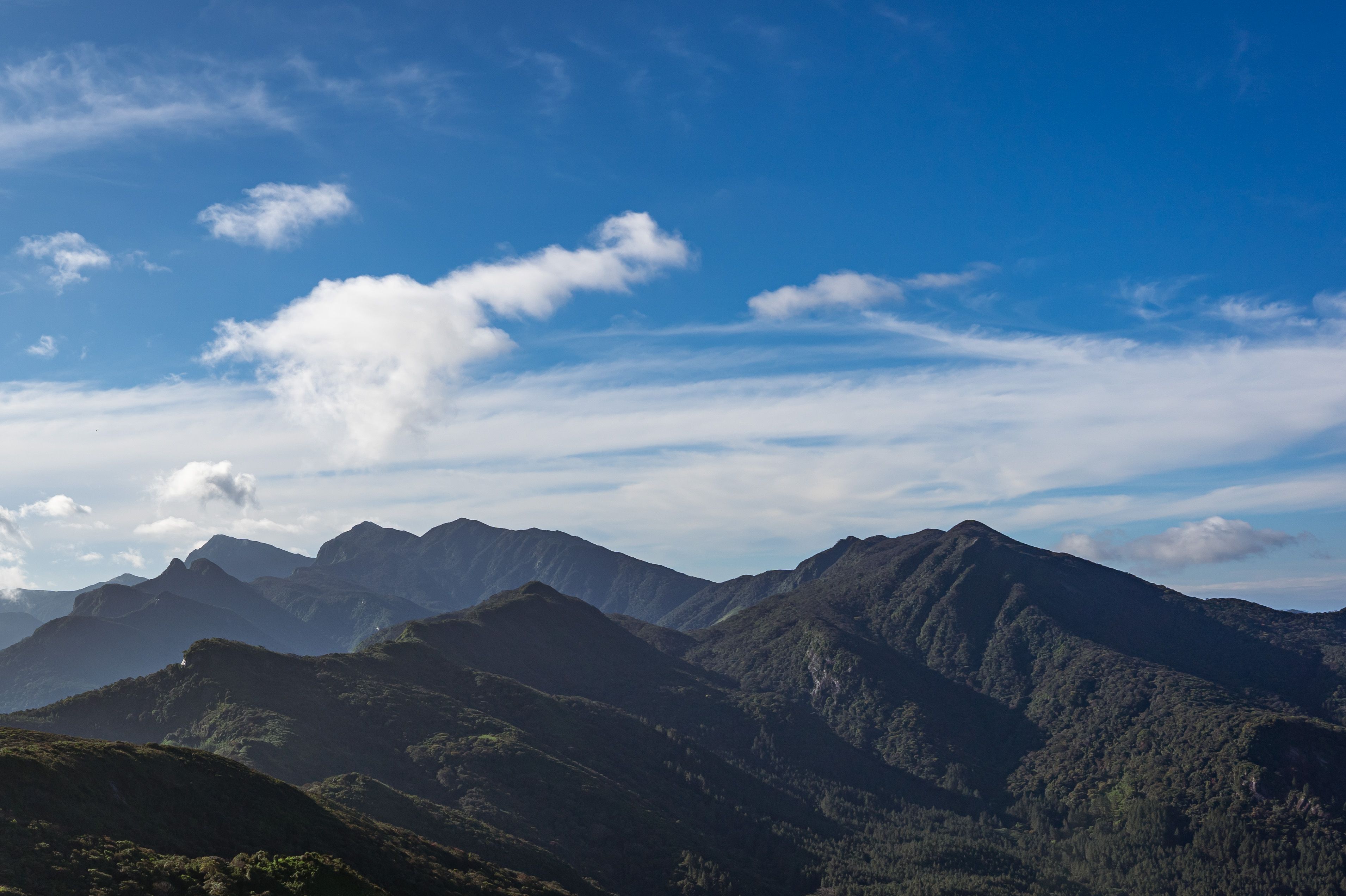 Breathtaking Mountain Range Under Clear Blue Sky · Free Stock Photo