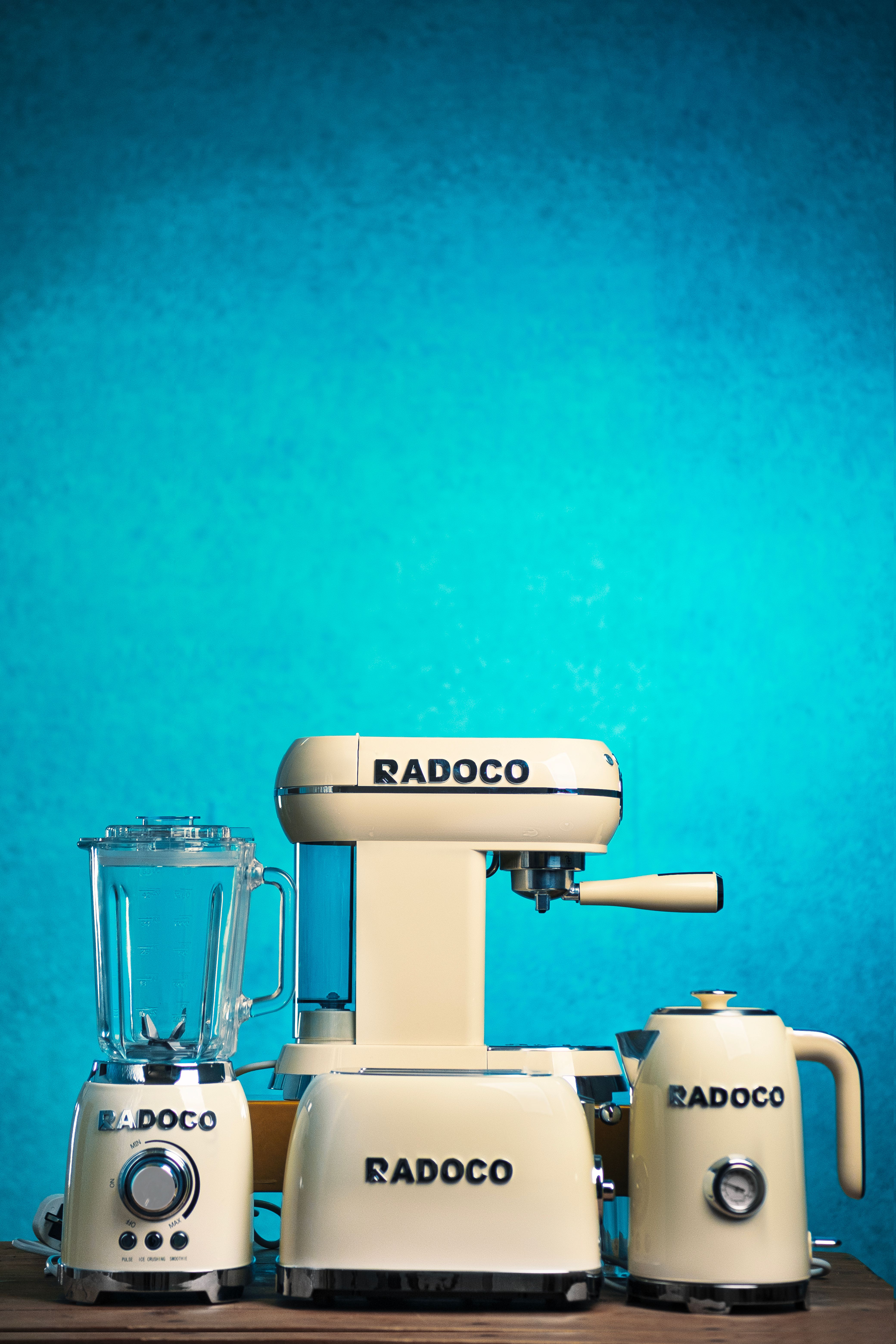 Vintage Radoco Kitchen Appliances Set Against Blue · Free Stock Photo