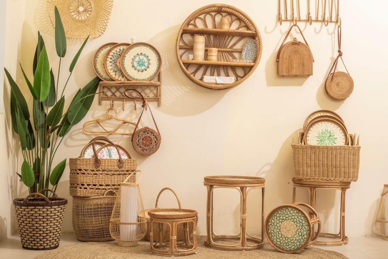 Bohemian interior with wicker baskets, rattan and plants