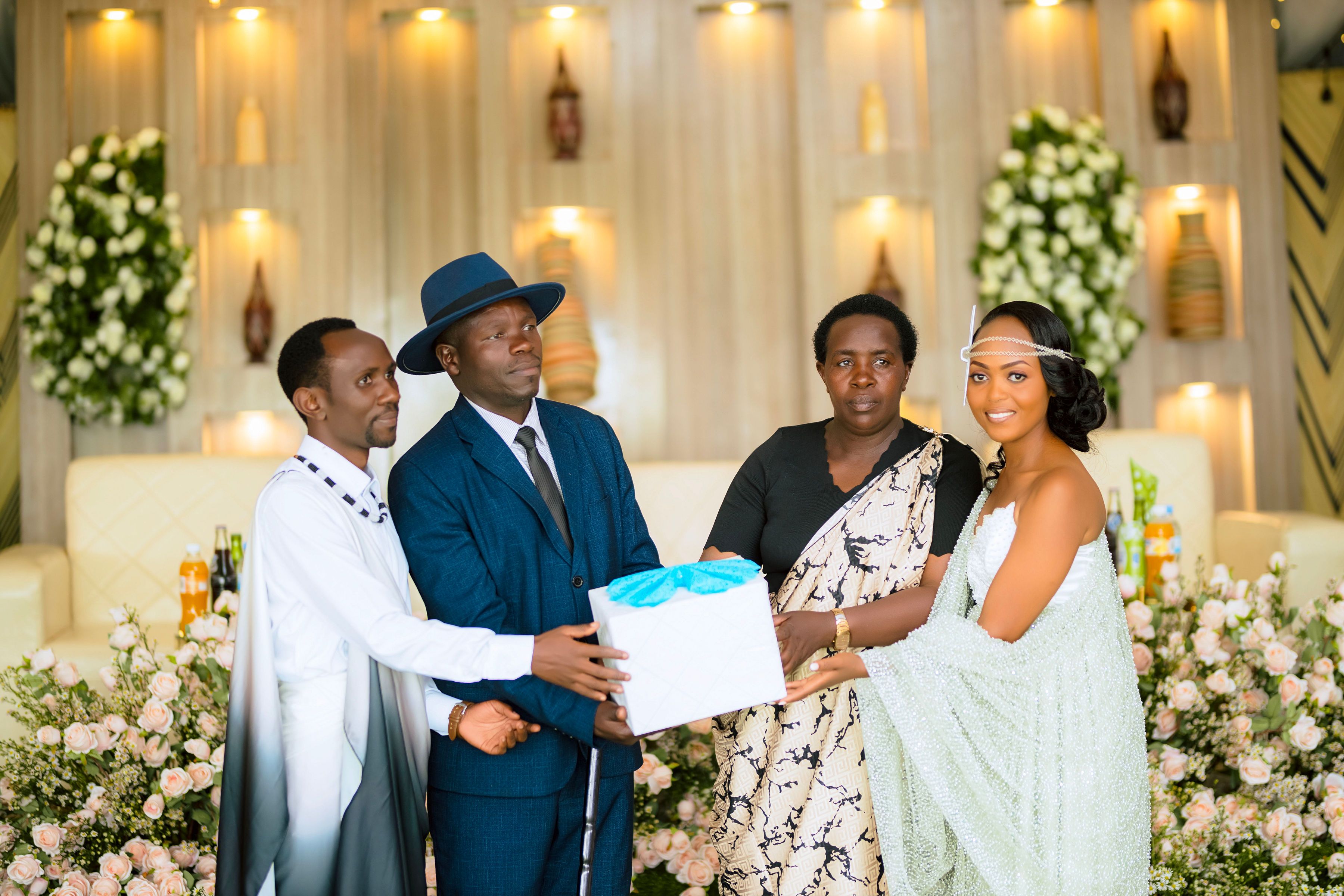 Vibrant image of a traditional African wedding celebration with gift exchange.