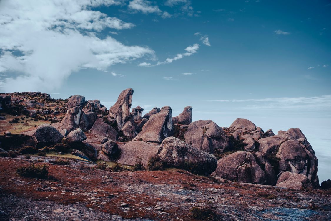 Unique Rock Formation Under a Clear Blue Sky · Free Stock Photo