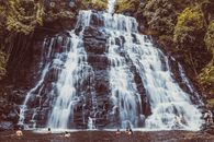 Time-Lapse Photography of People Near Waterfalls