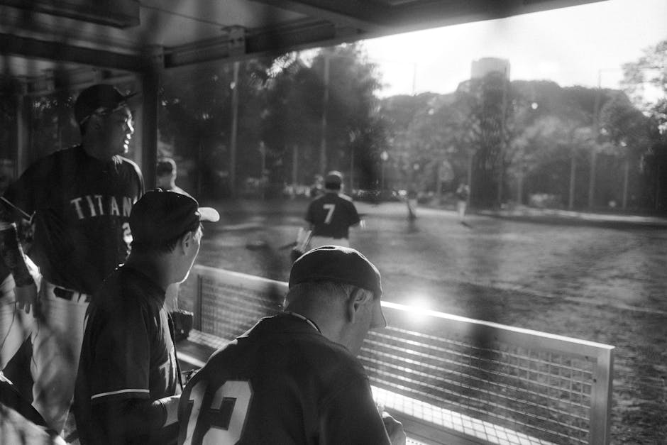baseball dugout players watching game