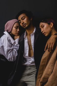 Trendy group portrait showcasing diverse fashion styles and togetherness.