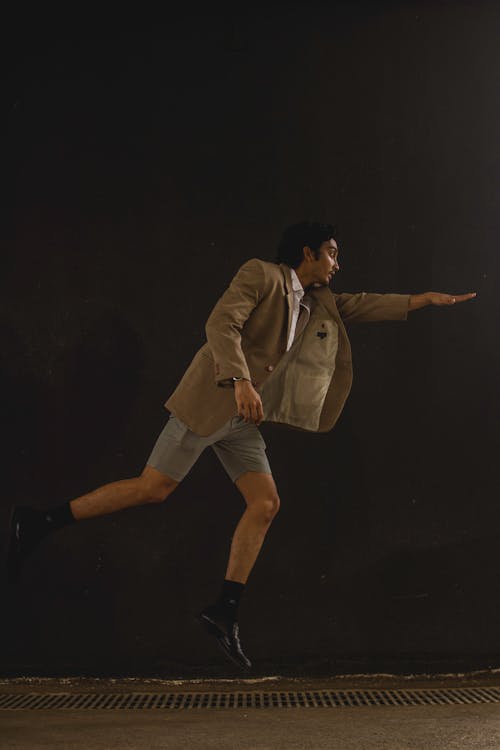 Photo of Man Doing Jump Shot