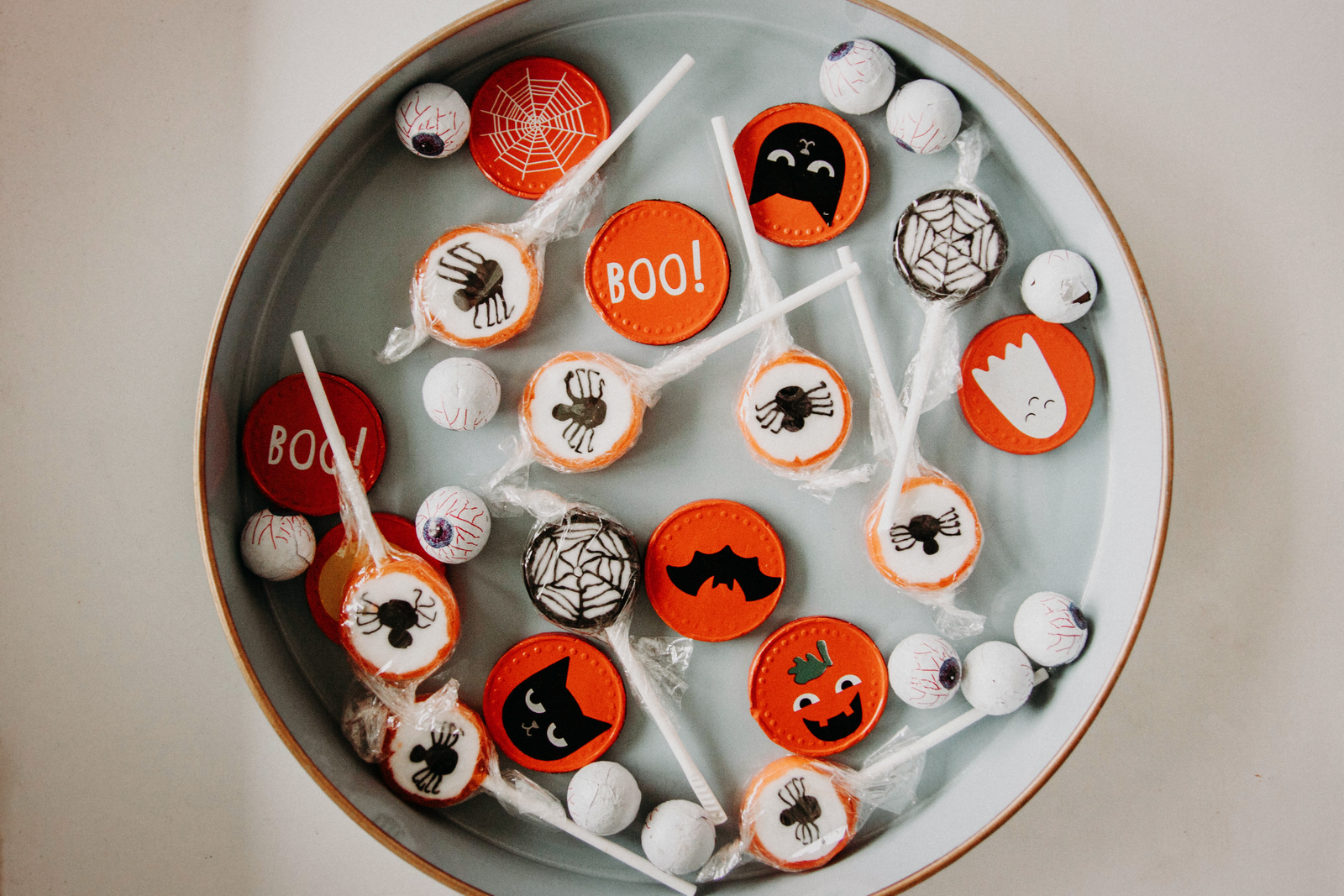 A vibrant bowl of assorted Halloween candy