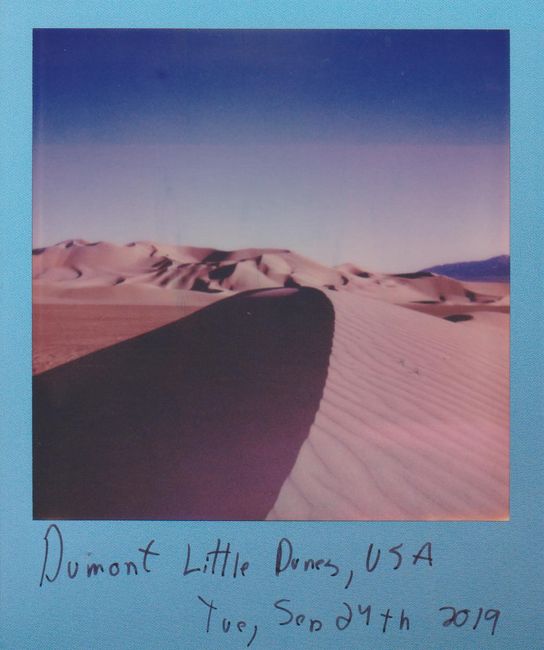 Vintage instant photo of Dumont Little Dunes, USA showing desert landscape at sunrise.